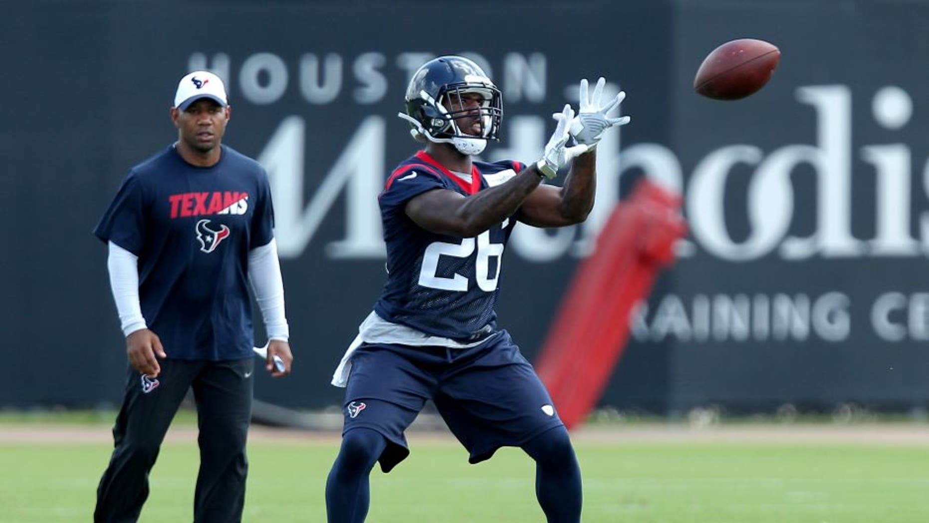 Jun 14, 2016; Houston, TX, USA; Houston Texans running back Lamar Miller (26) catches a short pass in offensive drills during Houston Texans minicamp at Methodist Training Center in Houston, TX. Mandatory Credit: Erik Williams-USA TODAY Sports