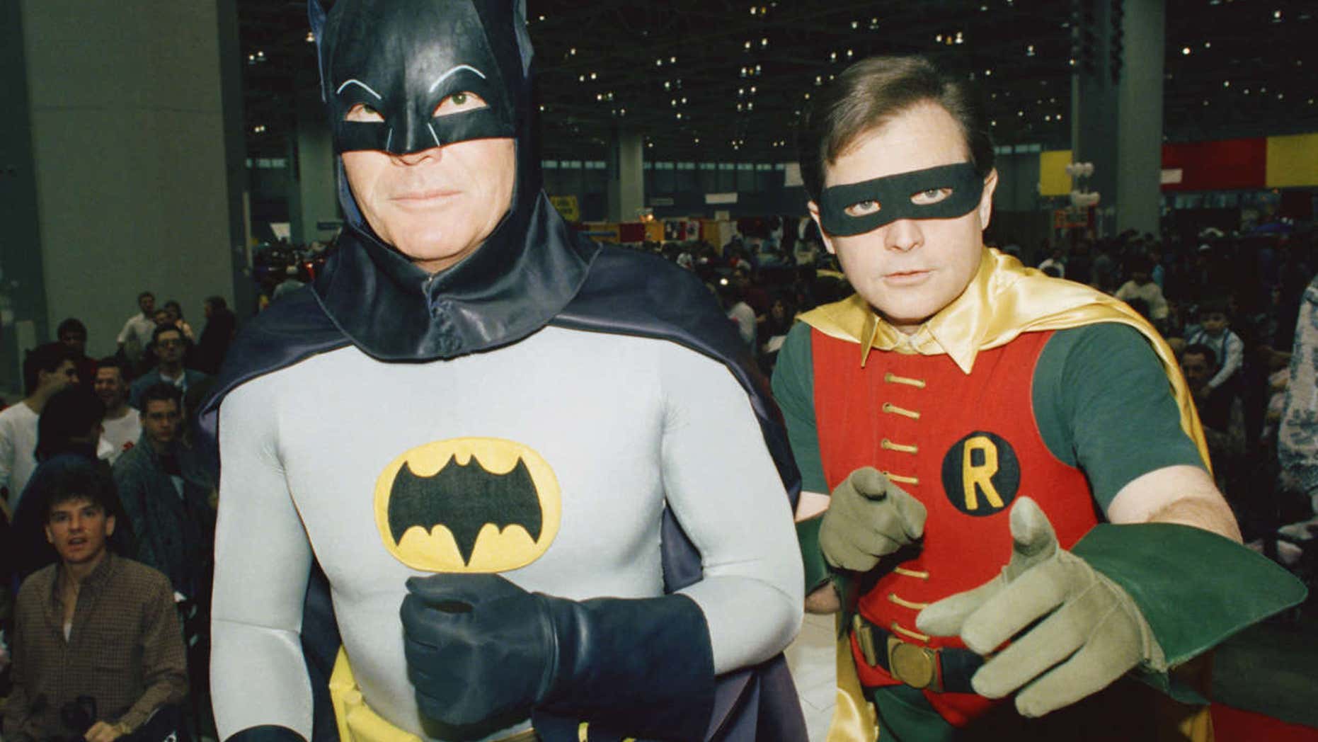 FILE - In this Jan. 27, 1989, file photo, actors Adam West, left, and Burt Ward, dressed as their characters Batman and Robin, pose for a photo at the "World of Wheels" custom car show in Chicago.