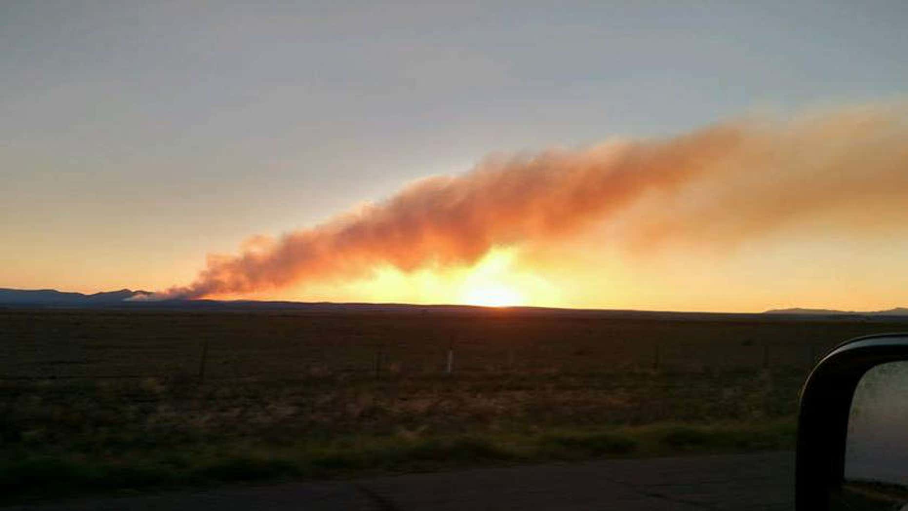 Photo shows wildfire burning in New Mexico in Manzano Mountains