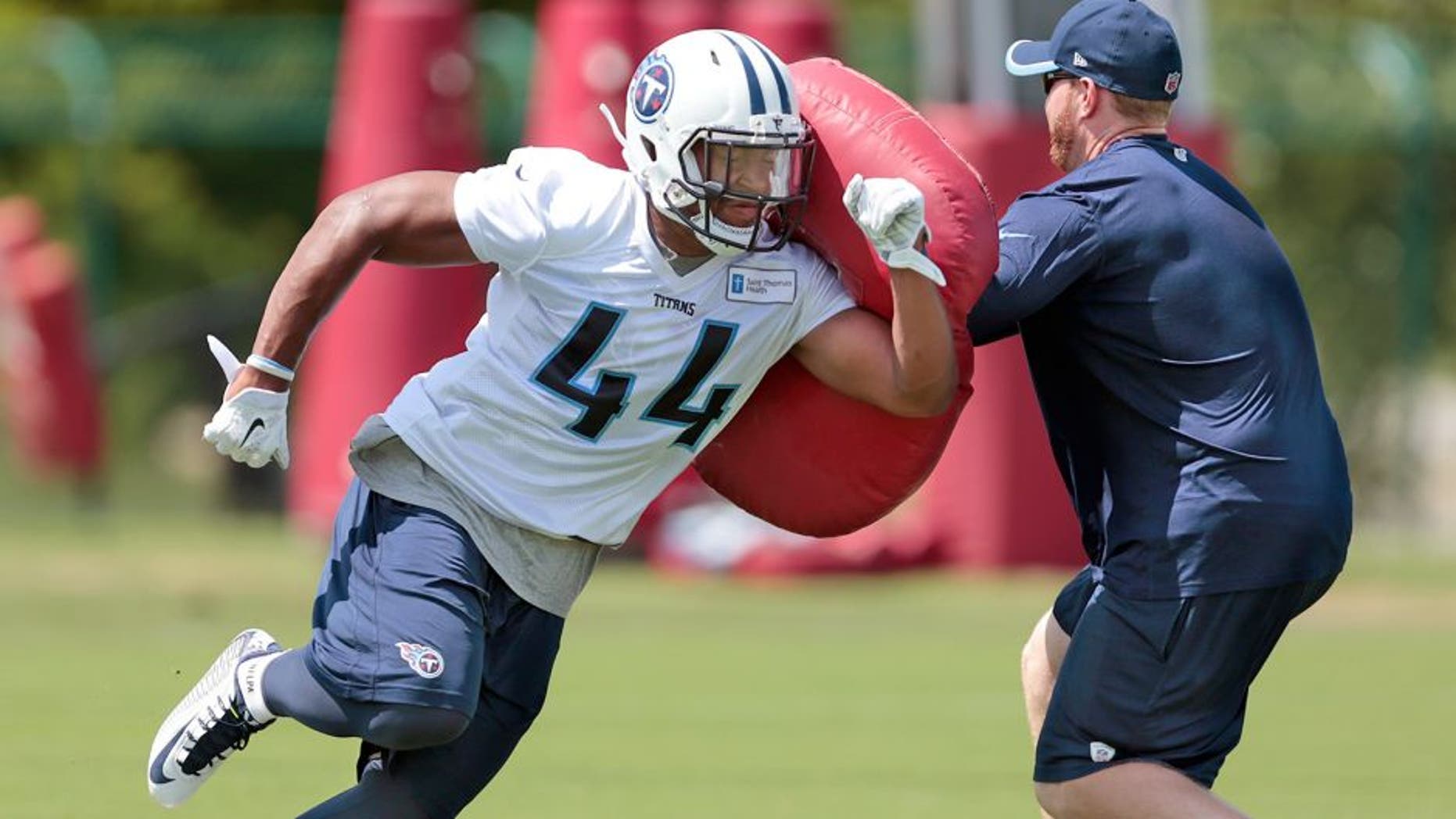 Tennessee Titans running back David Cobb (44) runs a drill during NFL football minicamp on Tuesday, June 16, 2015, in Nashville, Tenn. (AP Photo/Mark Humphrey)