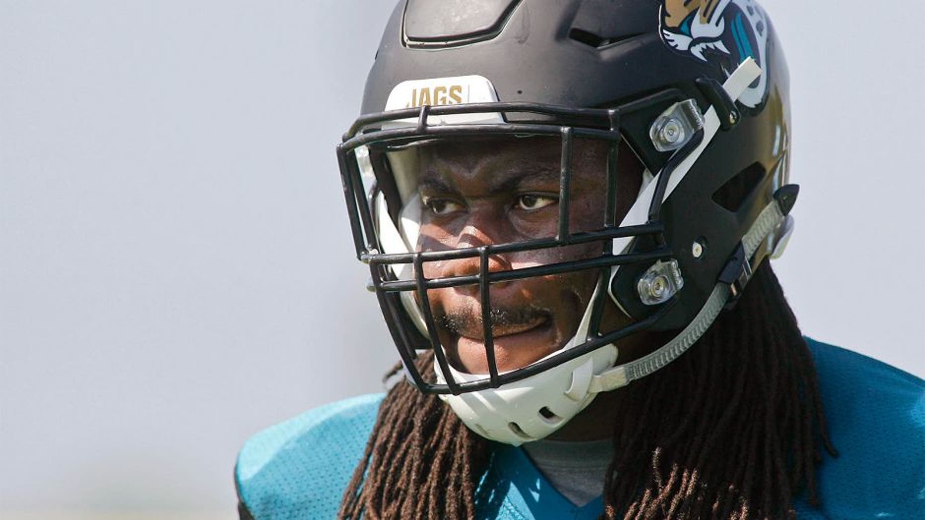 Jun 16, 2015; Jacksonville, FL, USA; Jacksonville Jaguars guard A.J. Cann (60) during minicamp at the Florida Blue Health and Wellness Practice Fields. Mandatory Credit: Phil Sears-USA TODAY Sports