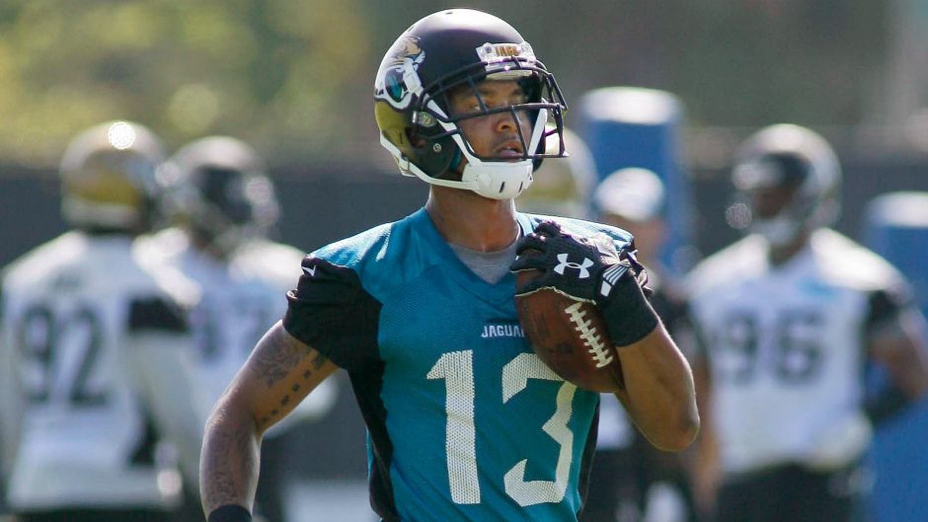 Jun 16, 2015; Jacksonville, FL, USA; Jacksonville Jaguars wide receiver Rashad Greene (13) returns a punt during minicamp at the Florida Blue Health and Wellness Practice Fields. Mandatory Credit: Phil Sears-USA TODAY Sports