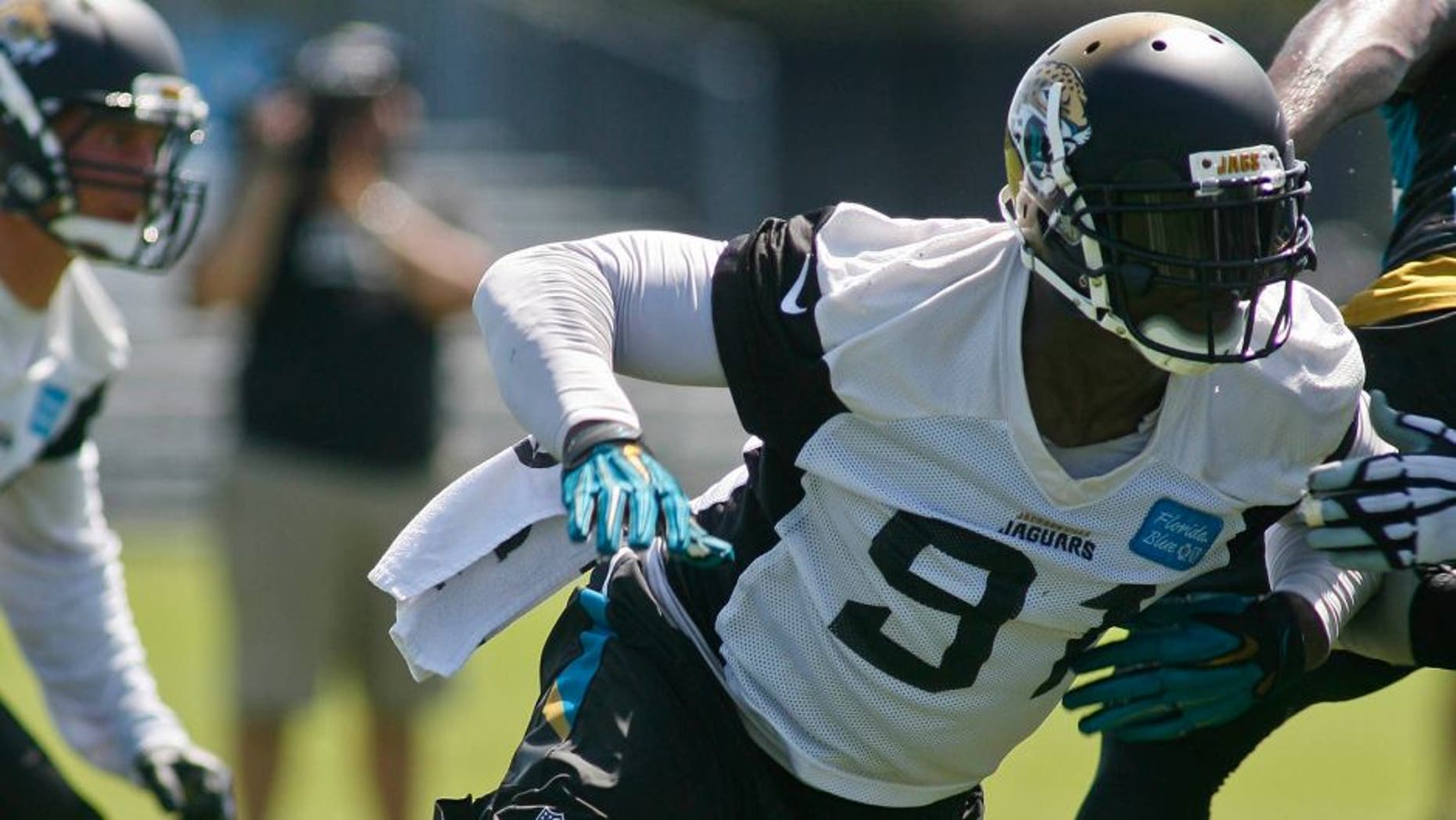 un 16, 2015; Jacksonville, FL, USA; Jacksonville Jaguars defensive end Chris Clemons (91) during minicamp at the Florida Blue Health and Wellness Practice Fields. Mandatory Credit: Phil Sears-USA TODAY Sports
