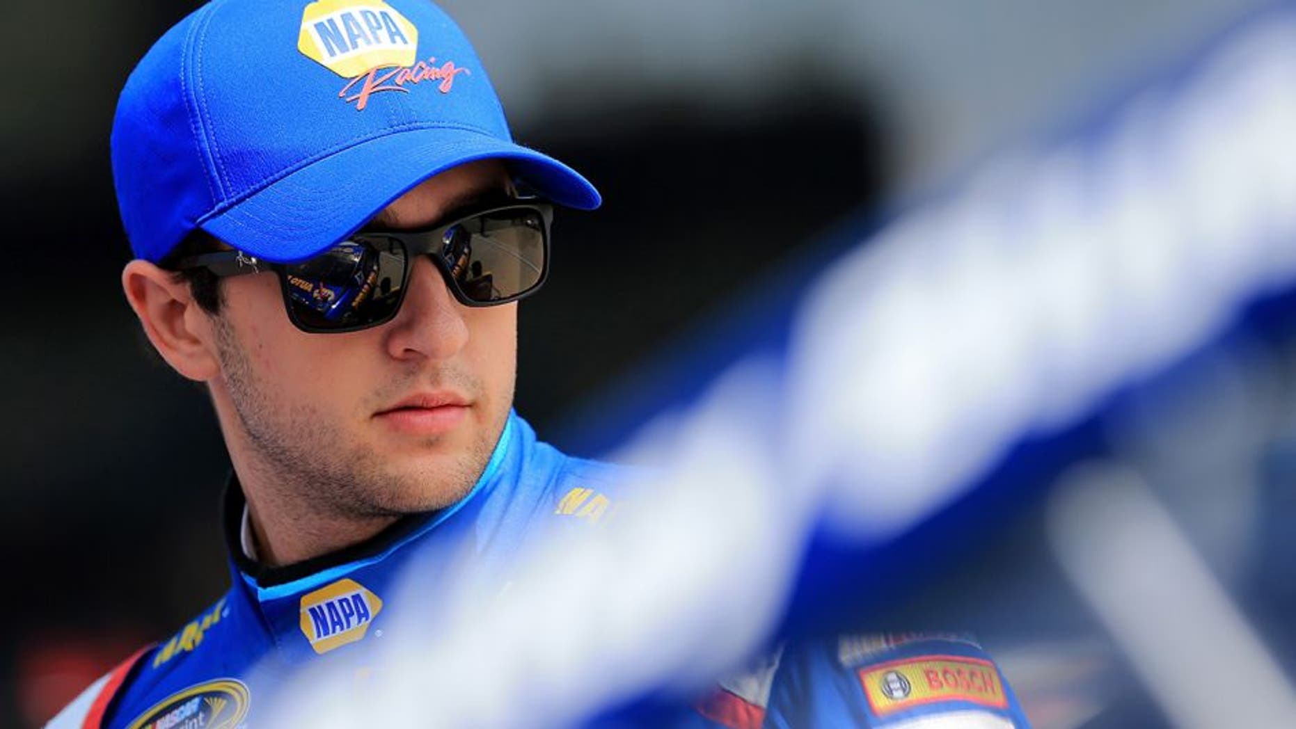 BROOKLYN, MI - JUNE 10: Chase Elliott, driver of the #24 NAPA Auto Parts Chevrolet, stands on the grid during qualifying for the NASCAR Sprint Cup Series FireKeepers Casino 400 at Michigan International Speedway on June 11, 2016 in Brooklyn, Michigan. (Photo by Daniel Shirey/NASCAR via Getty Images)