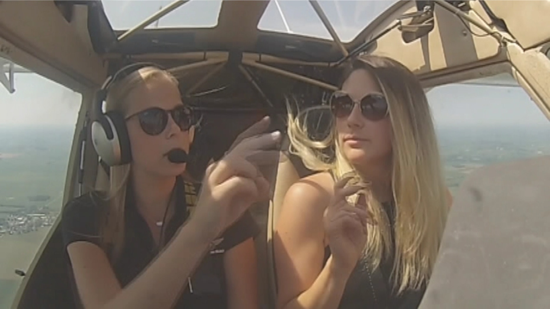 Instructor Andrea Hynek and Julia Velasquez enjoy a flying lesson in the high skies.