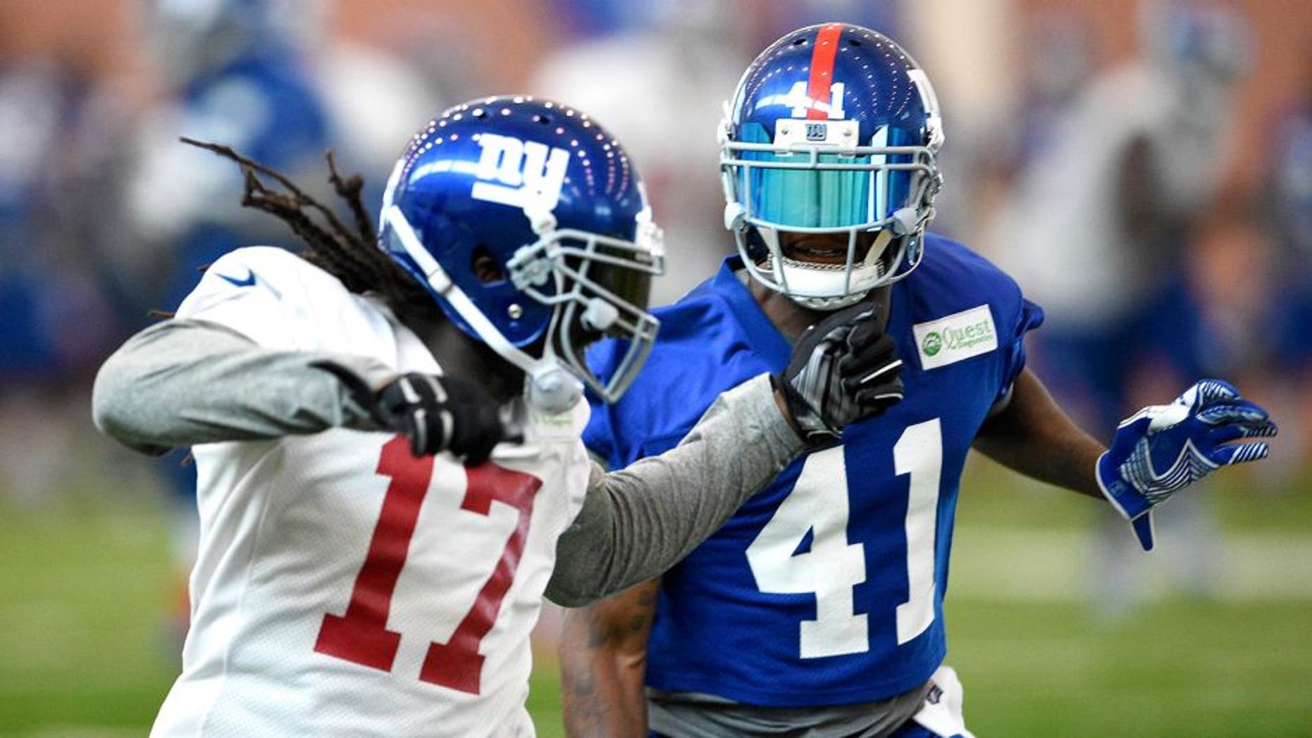Jun 16, 2015; East Rutherford, NJ, USA; New York Giants cornerback Dominique Rodgers-Cromartie (41) defends wide receiver Dwayne Harris (17) during minicamp at Quest Diagnostics Training Center. Mandatory Credit: Steven Ryan-USA TODAY Sports