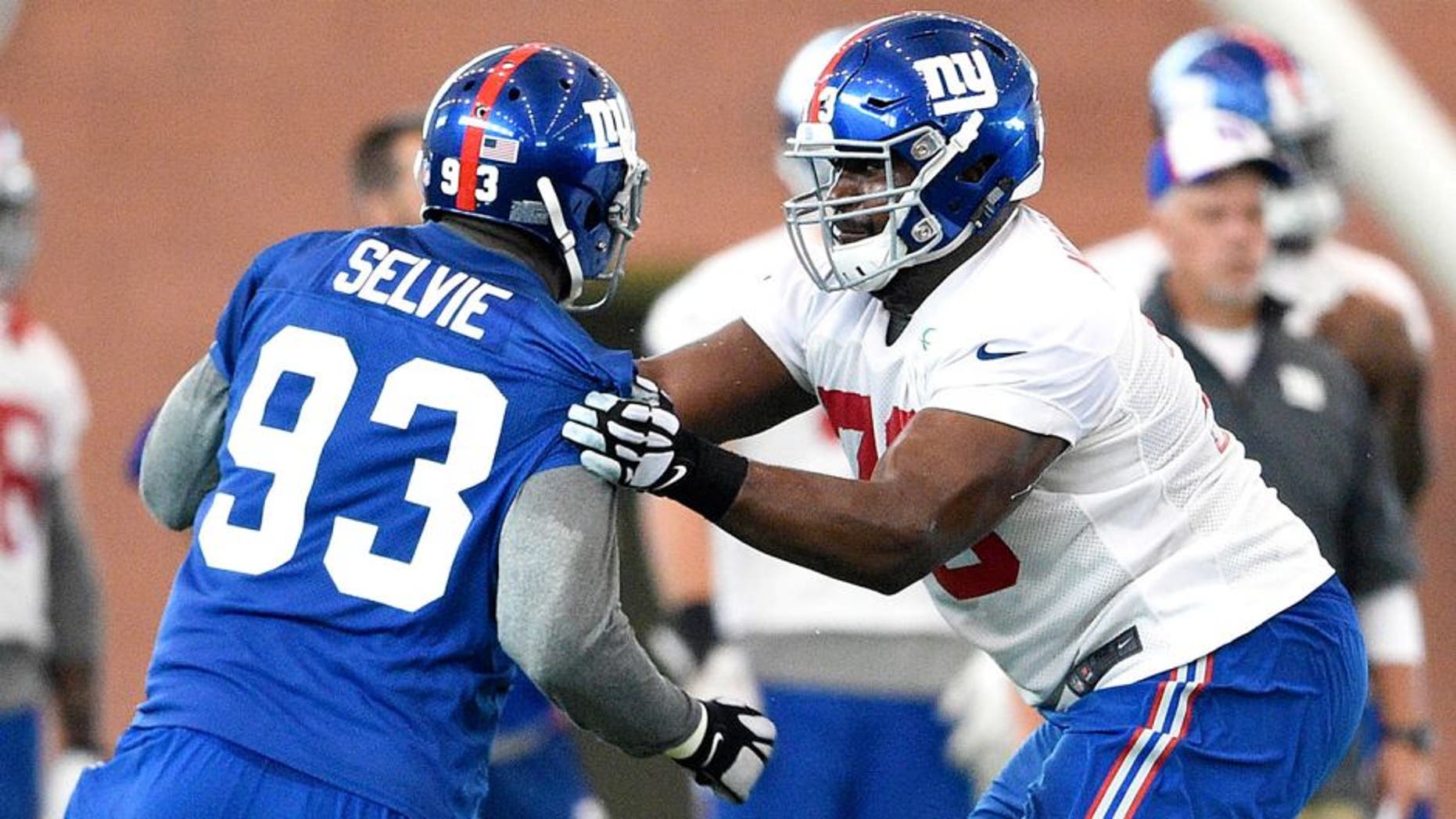 Jun 16, 2015; East Rutherford, NJ, USA; New York Giants tackle Marshall Newhouse (73) blocks defensive end George Selvie (93) during minicamp at Quest Diagnostics Training Center. Mandatory Credit: Steven Ryan-USA TODAY Sports