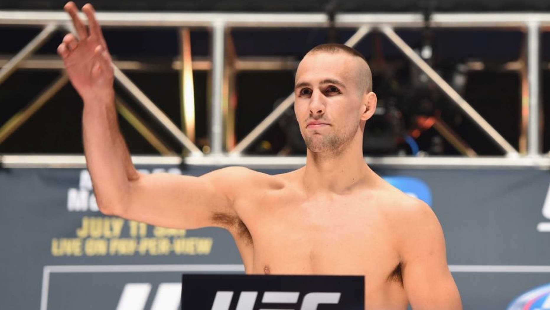 LAS VEGAS, NV - JULY 10: Rory MacDonald steps onto the scale during the UFC 189 weigh-in inside MGM Grand Garden Arena on July 10, 2015 in Las Vegas, Nevada. (Photo by Josh Hedges/Zuffa LLC/Zuffa LLC via Getty Images)