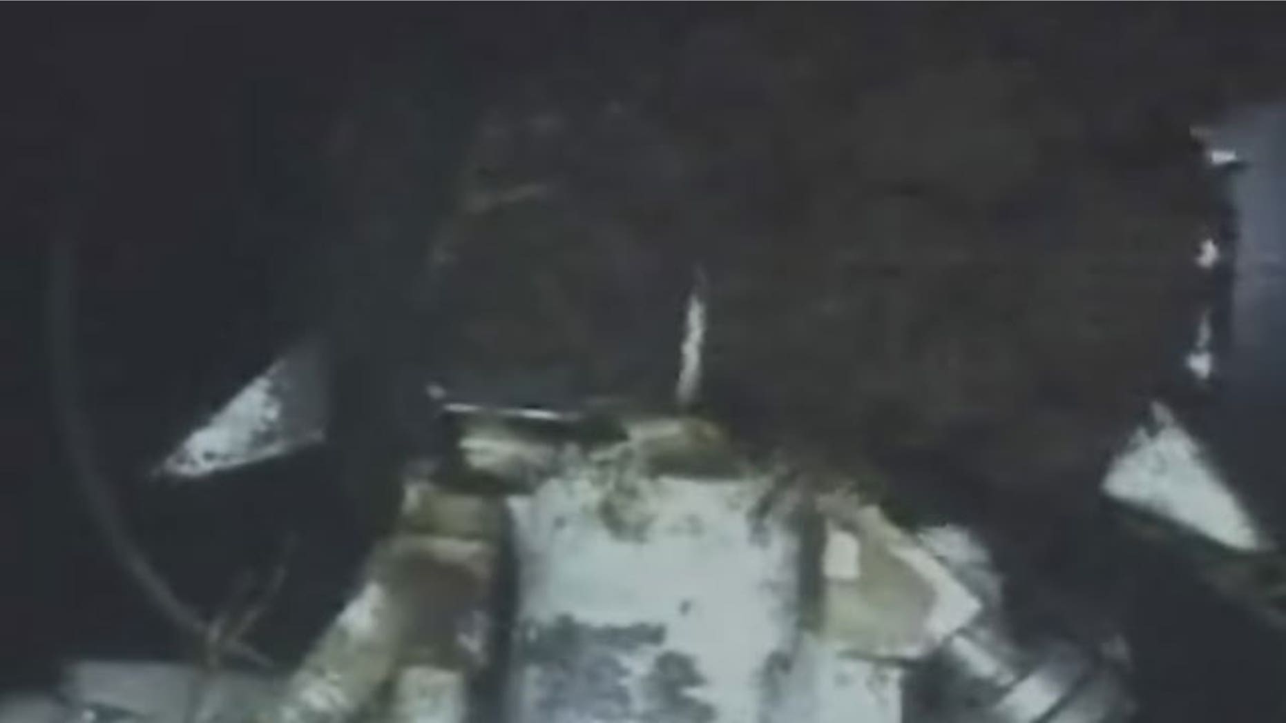 June 18: This image from video provided by BP PLC shows oil continuing to gush millions of gallons a day, from the broken wellhead, at the site of the Deepwater Horizon oil well in the Gulf of Mexico.
