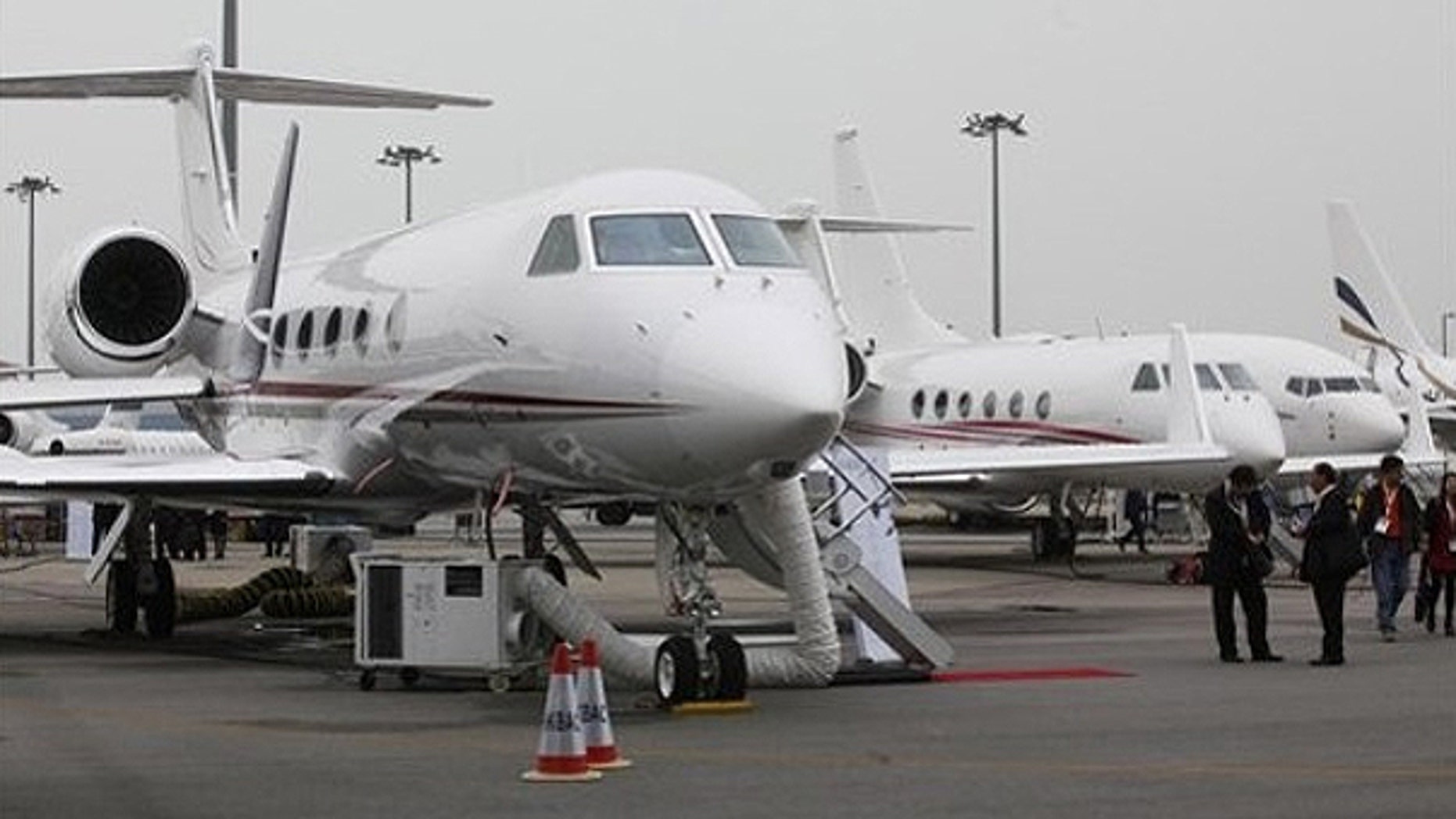 March 8: A Gulfstream G450 business jet, left, is displayed during the Asian Aerospace Show in Hong Kong .