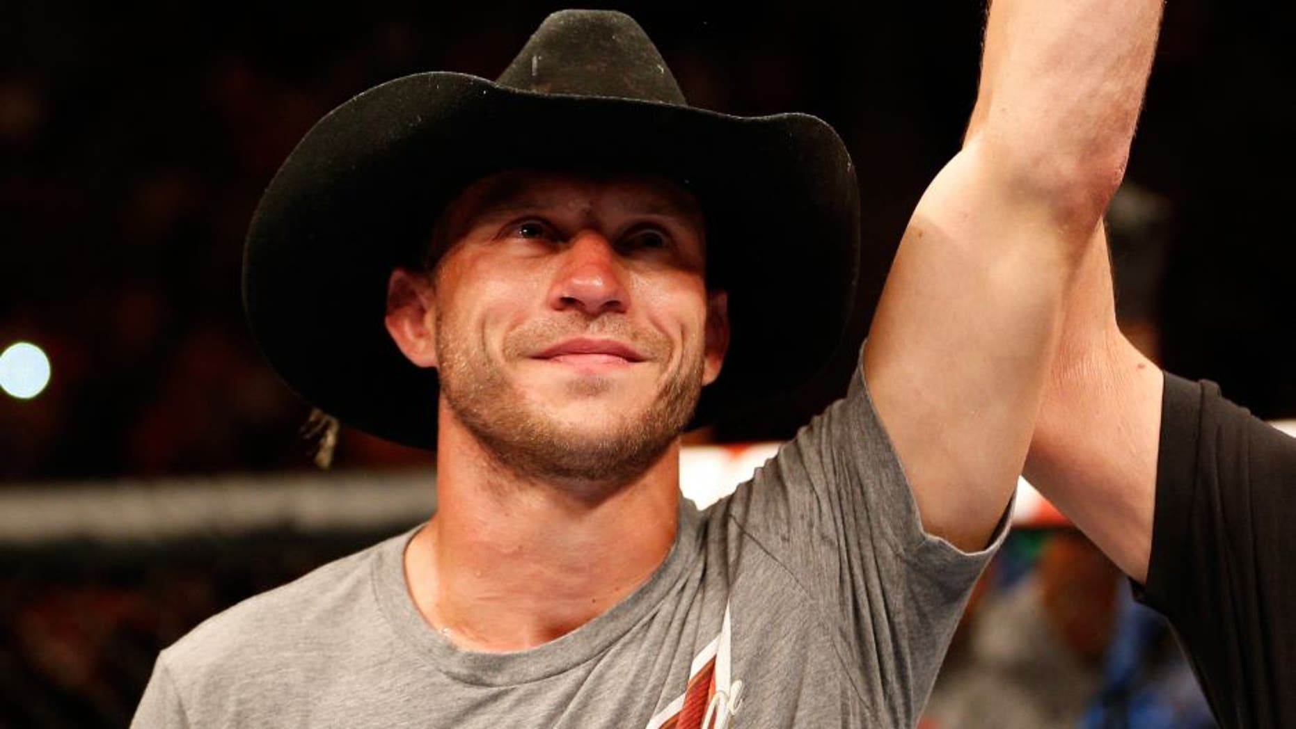 ORLANDO, FL - APRIL 19: Donald "Cowboy" Cerrone reacts after his submission victory over Edson Barboza in their lightweight bout during the FOX UFC Saturday event at the Amway Center on April 19, 2014 in Orlando, Florida. (Photo by Josh Hedges/Zuffa LLC/Zuffa LLC via Getty Images)