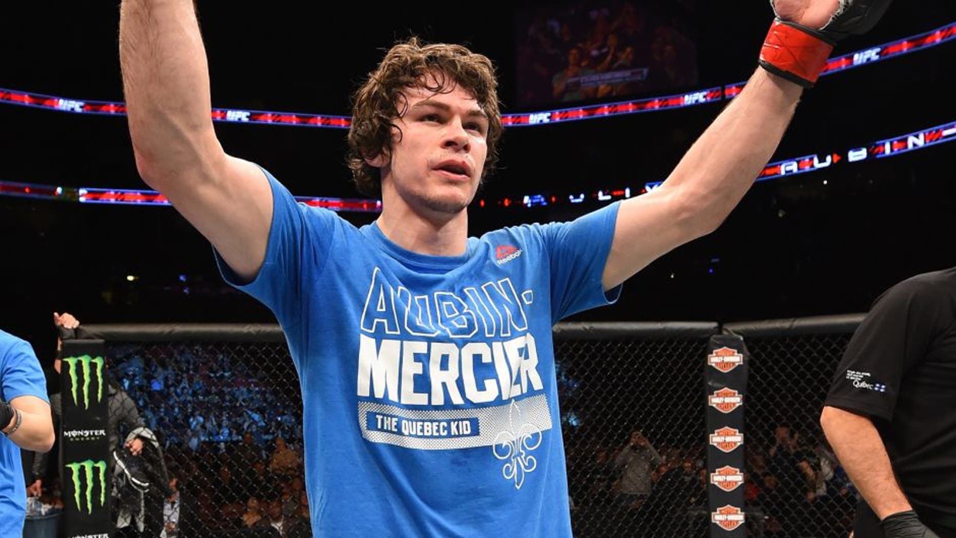 MONTREAL, QC - APRIL 25: Olivier Aubin-Mercier of Canada reacts after his submission victory over David Michaud of the United States in their lightweight bout during the UFC 186 event at the Bell Centre on April 25, 2015 in Montreal, Quebec, Canada. (Photo by Josh Hedges/Zuffa LLC/Zuffa LLC via Getty Images)