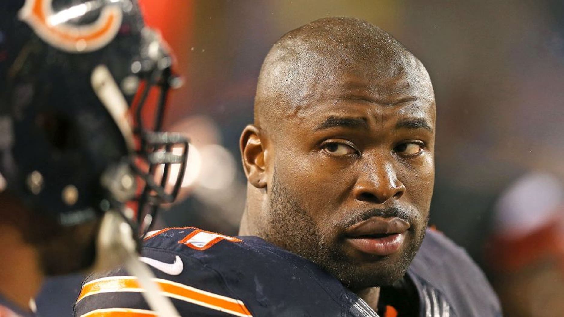 CHICAGO, IL - NOVEMBER 11: Israel Idonije #71 of the Chicago Bears watches the final seconds of a game against the Houston Texans at Soldier Field on November 11, 2012 in Chicago, Illinois. The Texans defeated the Bears 13-6. (Photo by Jonathan Daniel/Getty Images) *** Local Caption *** Israel Idonije