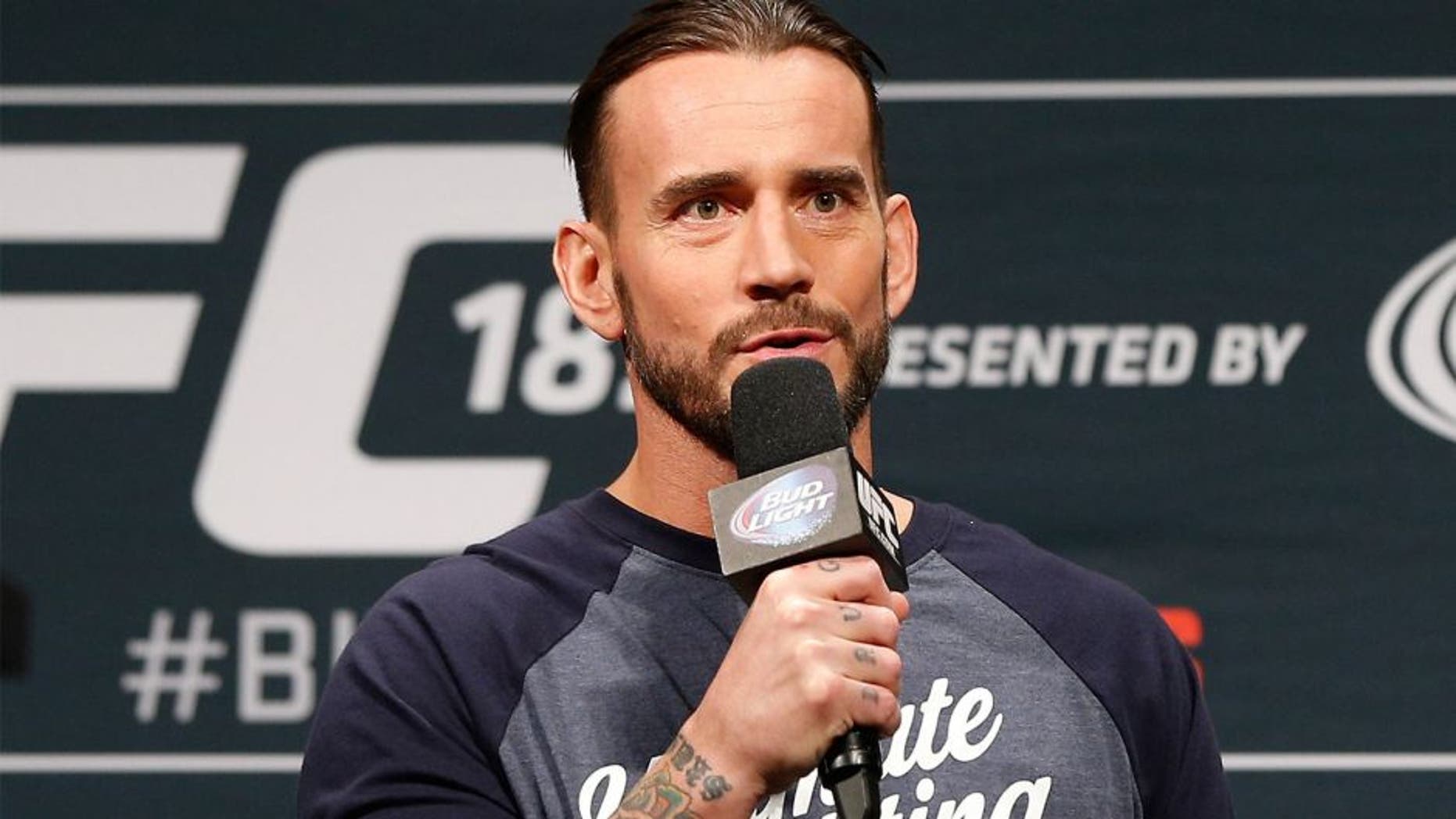 LAS VEGAS, NV - JANUARY 02: Phil "C.M. Punk" Brooks interacts with fans during a Q&A session before the UFC 182 weigh-in event at the MGM Grand Conference Center on January 2, 2015 in Las Vegas, Nevada. (Photo by Josh Hedges/Zuffa LLC/Zuffa LLC via Getty Images)