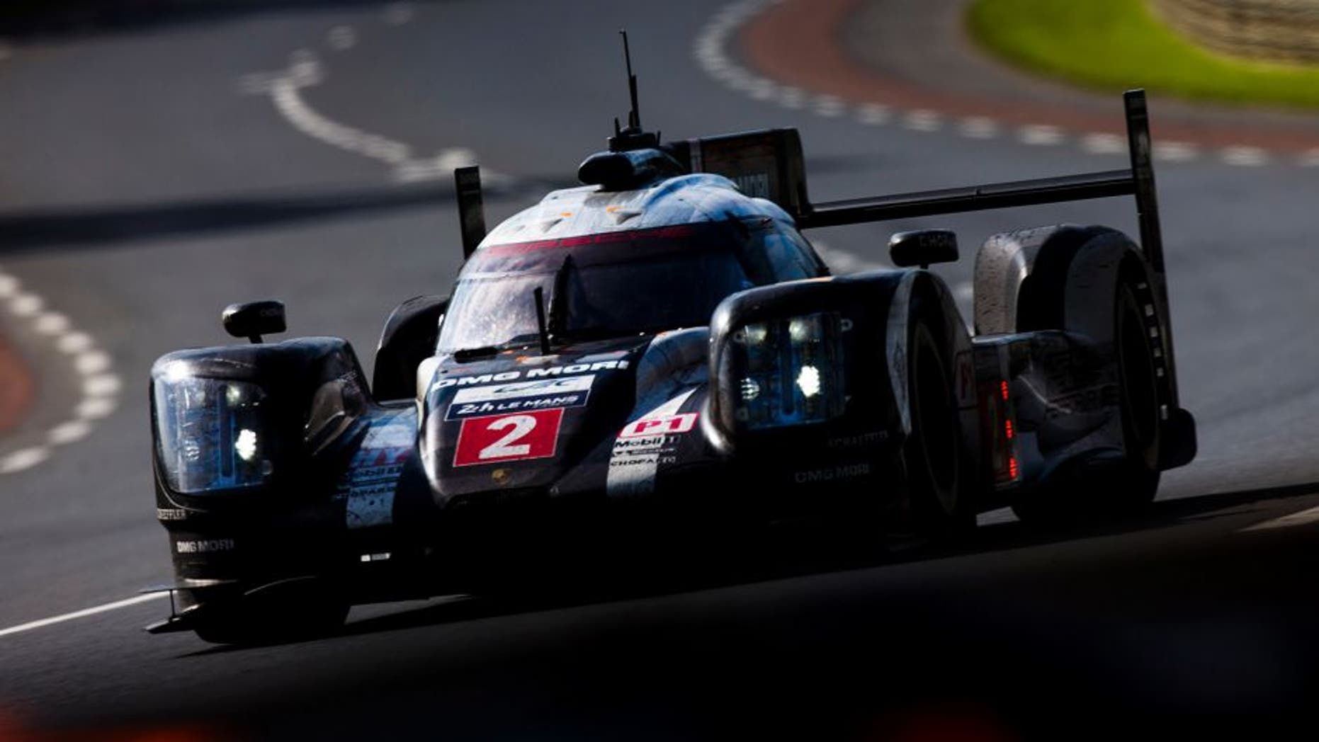 2016 Le Mans 24 Hours. Circuit de la Sarthe, Le Mans, France. Sunday 19 June 2016. Porsche Team / Porsche 919 Hybrid - Romain Dumas (FRA), Neel Jani (CHE), Marc Lieb (DEU). World Copyright: Zak Mauger/LAT Photographic ref: Digital Image _79P8808