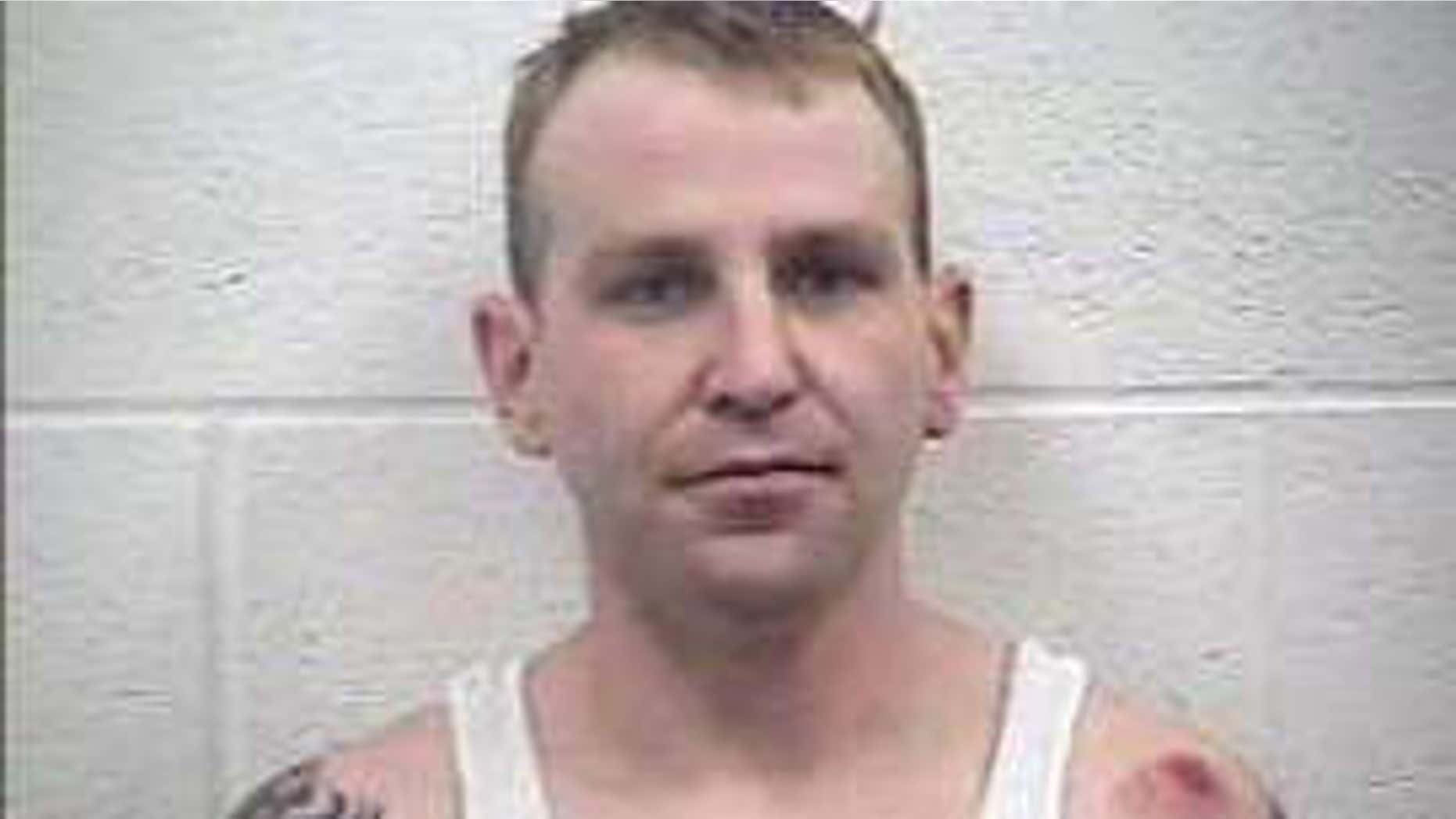 This photo provided by Kenton County Jail shows Brian Parnell.