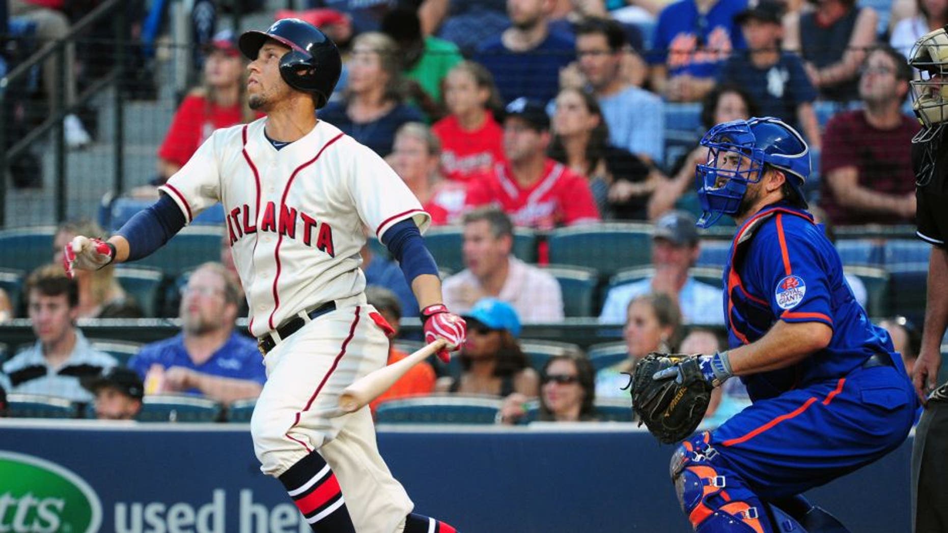 ATLANTA, GA - JUNE 20: Andrelton Simmons #19 of the Atlanta Braves knocks in a run with a second inning single against the New York Mets at Turner Field on June 20, 2015 in Atlanta, Georgia. (Photo by Scott Cunningham/Getty Images)