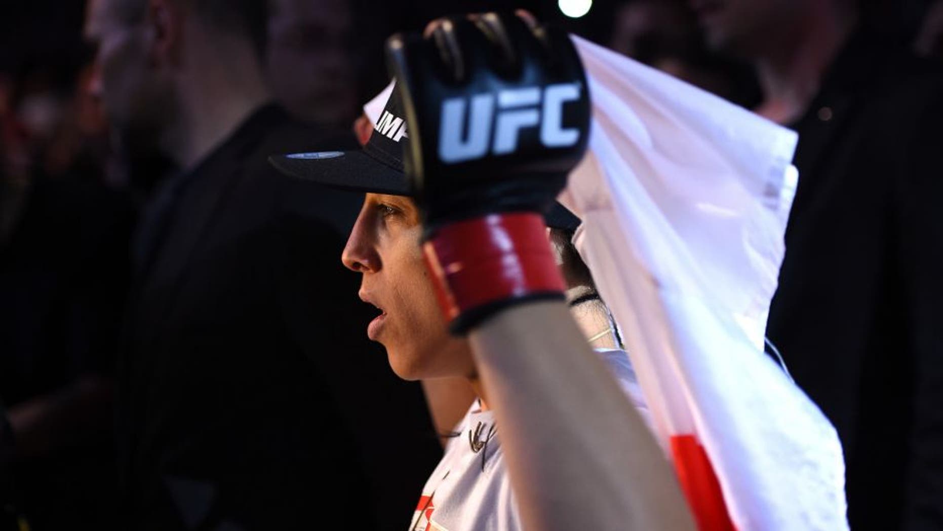 BERLIN, GERMANY - JUNE 20: UFC women's strawweight champion Joanna Jedrzejczyk of Poland enters the arena before facing Jessica Penne of the United States in their women's strawweight championship bout during the UFC Fight Night event at the O2 World on June 20, 2015 in Berlin, Germany. (Photo by Josh Hedges/Zuffa LLC/Zuffa LLC via Getty Images)