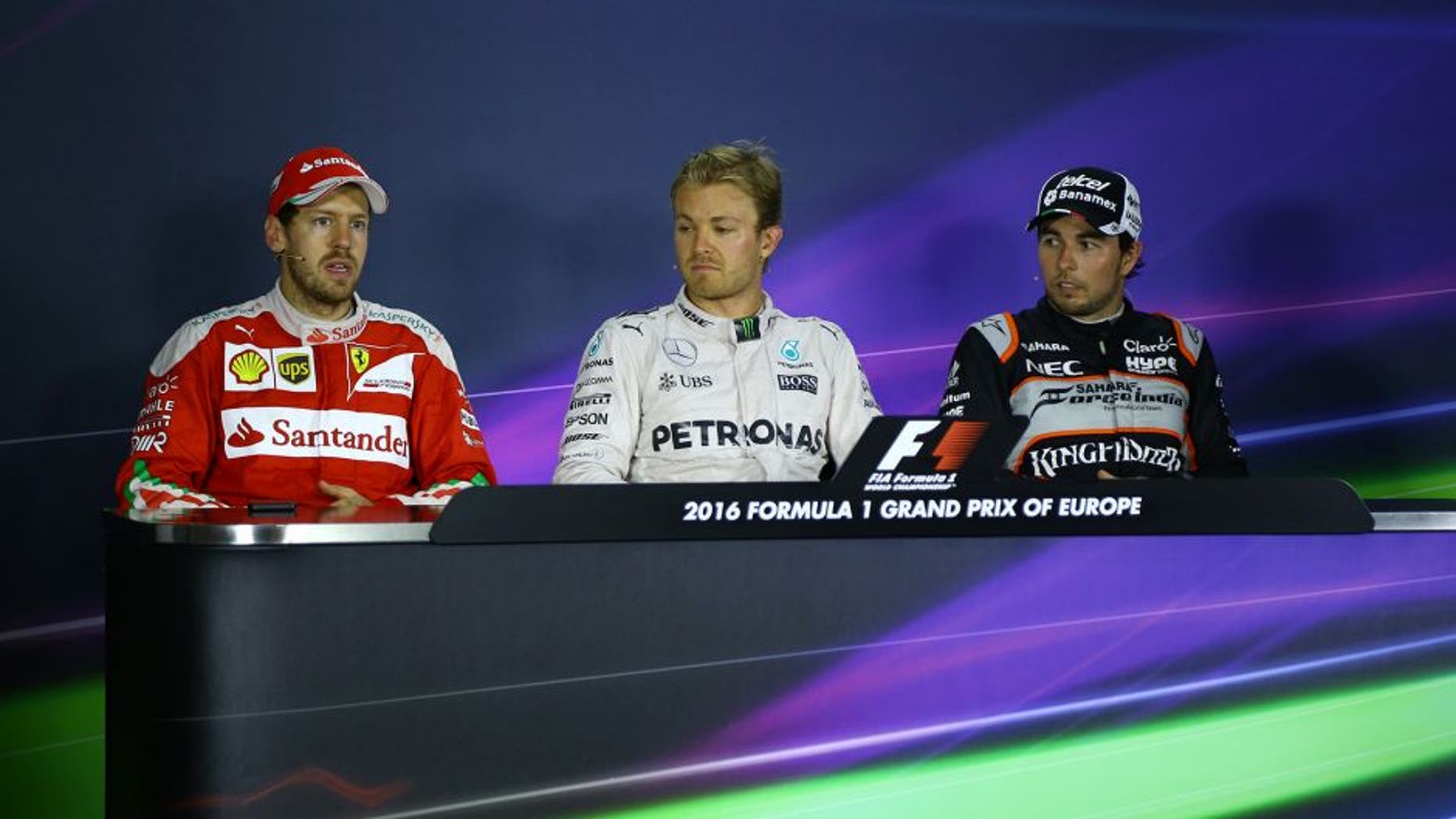 BAKU, AZERBAIJAN - JUNE 19: Nico Rosberg (C) of Mercedes AMG Pertronas F1 (C), Ferrari's Sebastian Vettel (L) and Sergio Perez (R) of Sahara Force India F1 attend a press conference during the 2016 Formula One Grand Prix of Europe in Baku, Azerbaijan on June 19, 2016. (Photo by Resul Rehimov/Anadolu Agency/Getty Images)