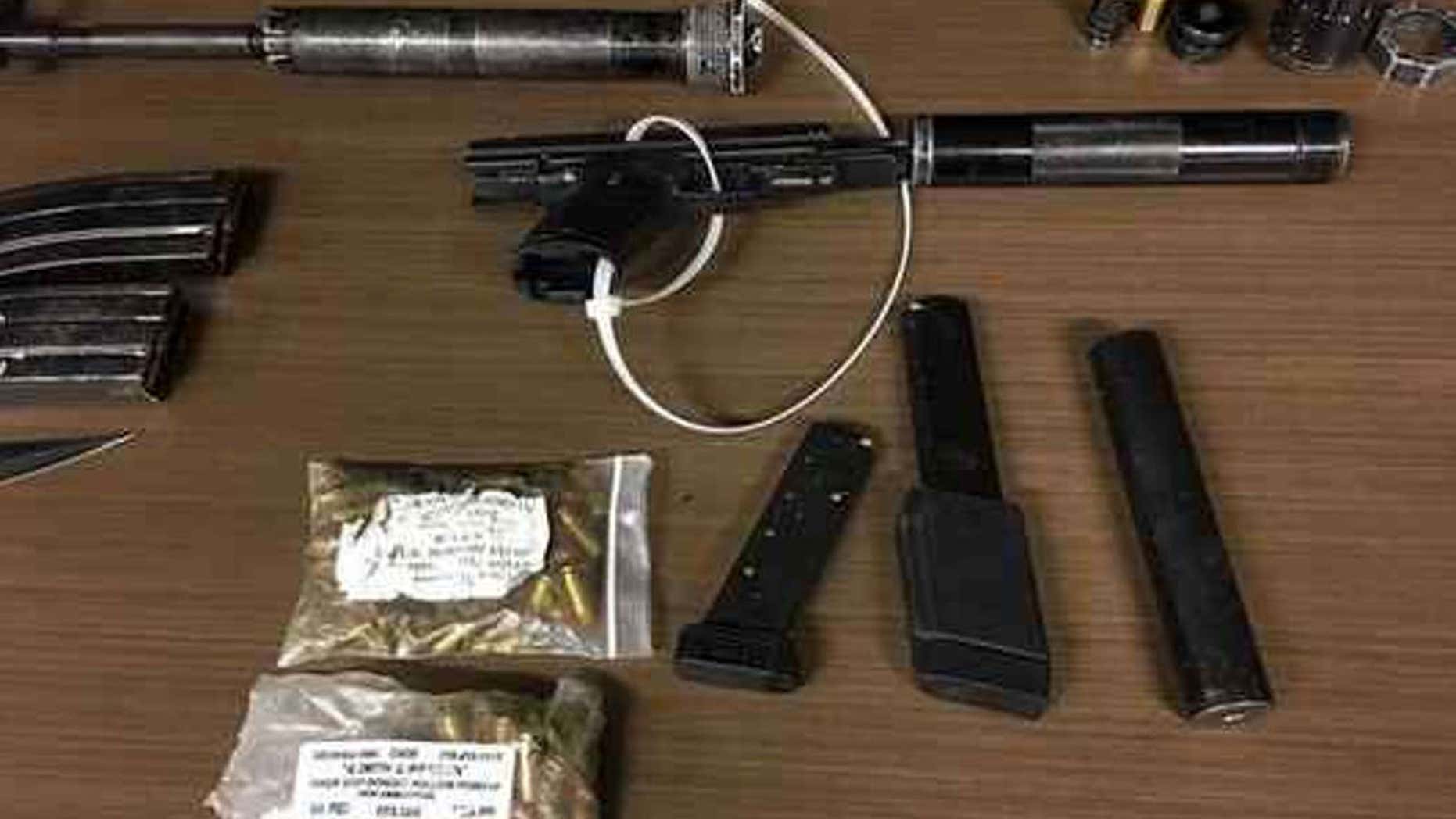 Weapons Christopher Goodine was allegedly carrying.