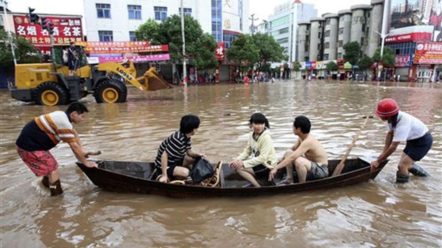 Rains burst levee in southern China, 88,000 flee latest disaster in