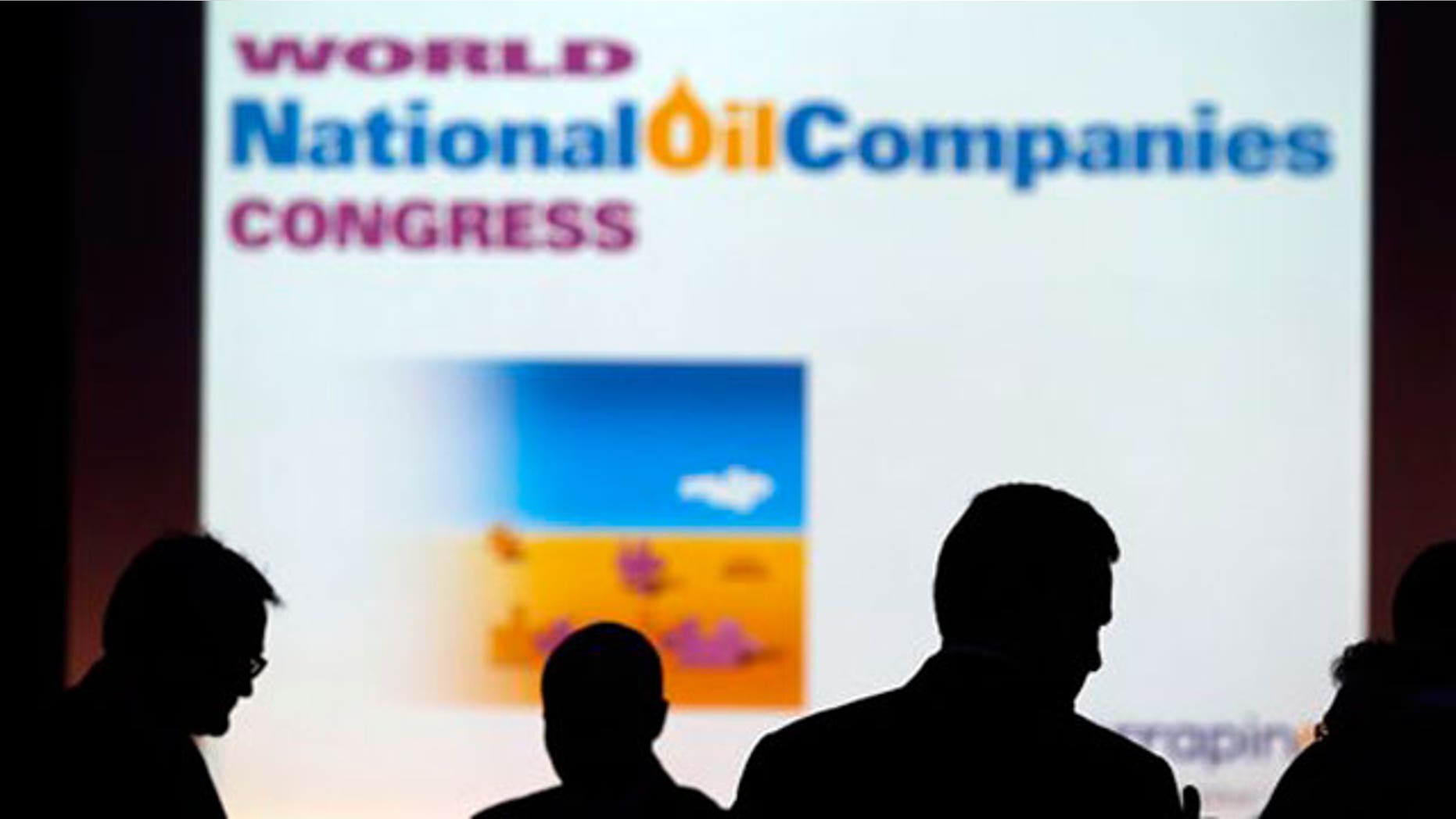 June 22: Delegates are seen during a break of the sessions of the World National Oil Companies Congress, in London.