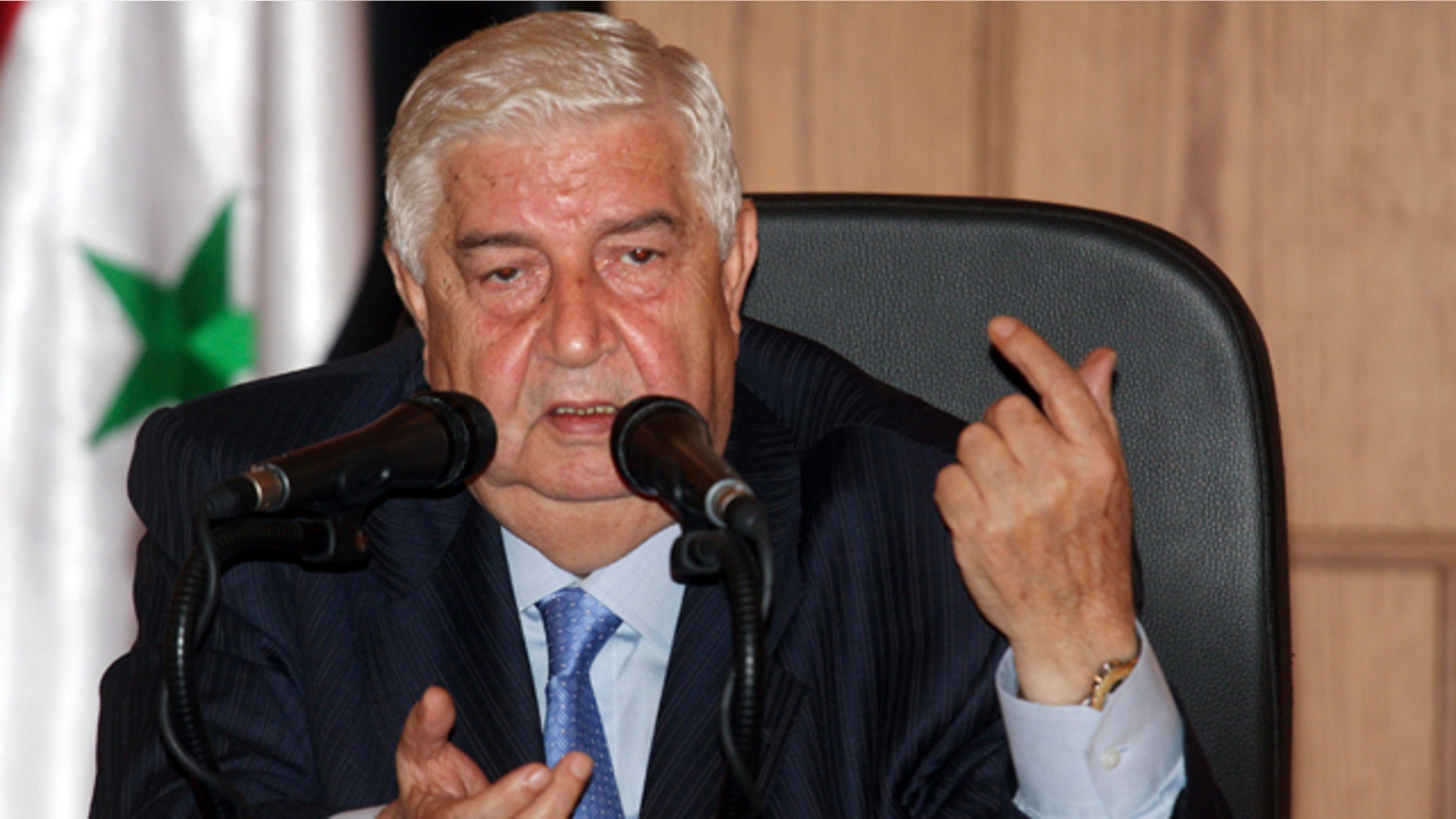 June 22: Syrian Foreign Minister Walid Moallem speaks during a news conference in Damascus, Syria.