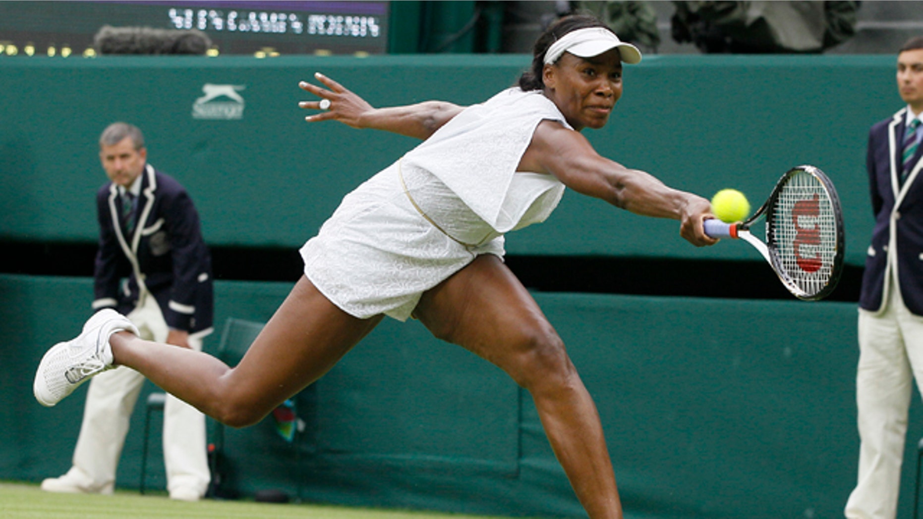 June 22: Venus Williams in action during the match against Kimiko Date-Krumm at the All England Lawn Tennis Championships at Wimbledon.