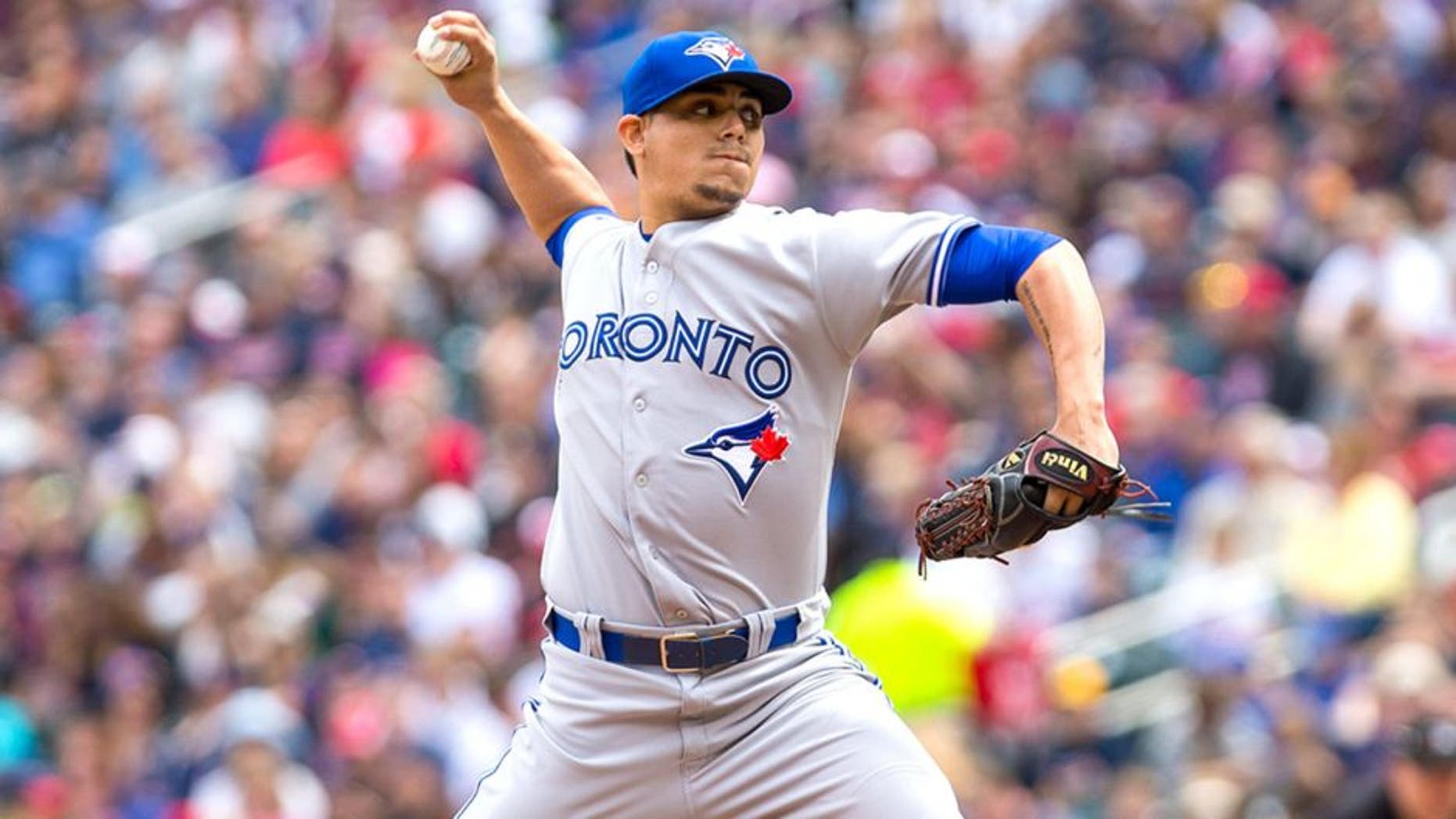 May 31, 2015; Minneapolis, MN, USA; Toronto Blue Jays relief pitcher Roberto Osuna (54) pitches in the sixth inning against the Minnesota Twins at Target Field. The Twins won 6-5. Mandatory Credit: Brad Rempel-USA TODAY Sports