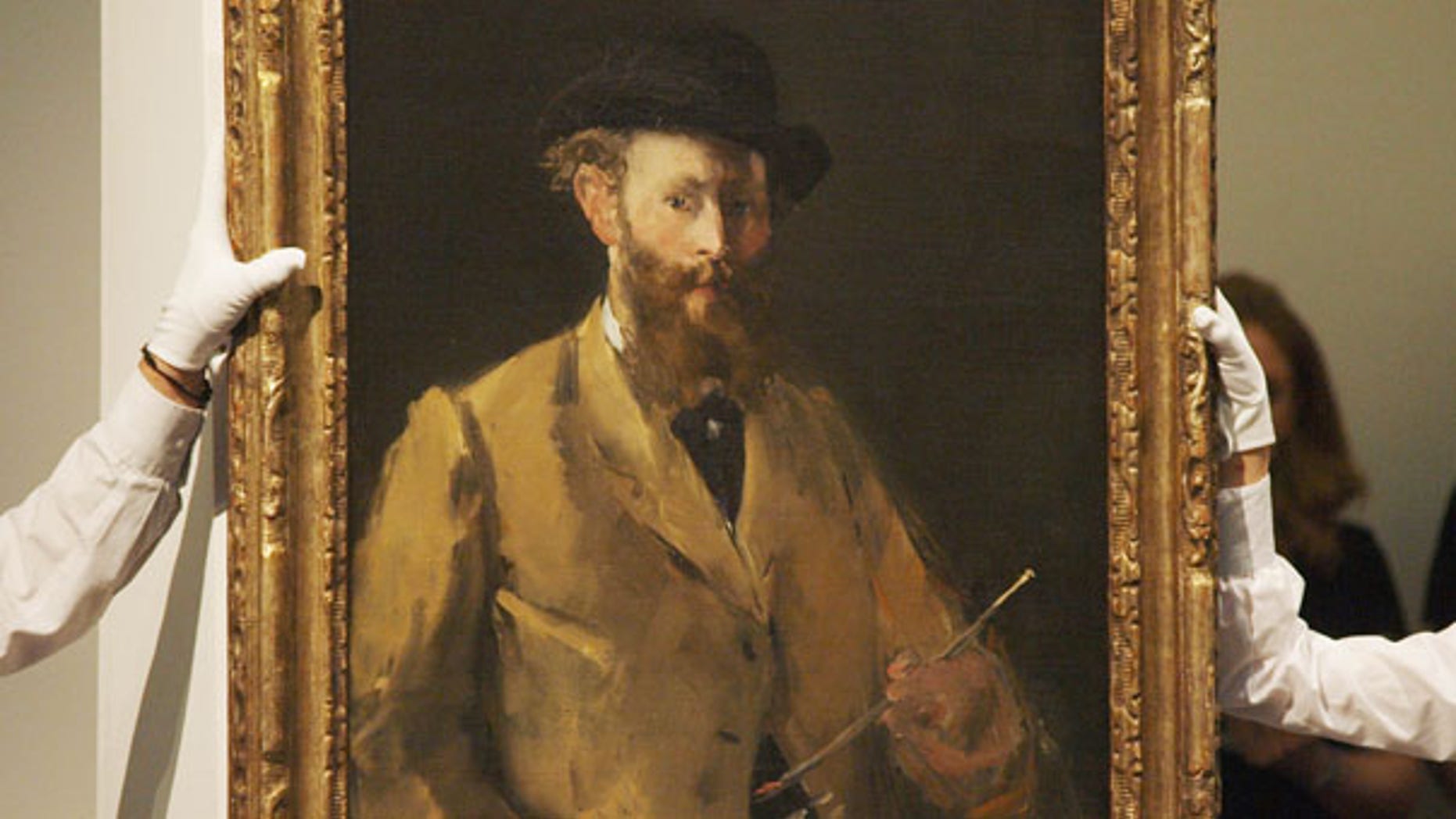 June 22: View of French Impressionist Edouard Manet's 'Self Portrait,' which sold at auction at Sotheby's in London for $33 million.