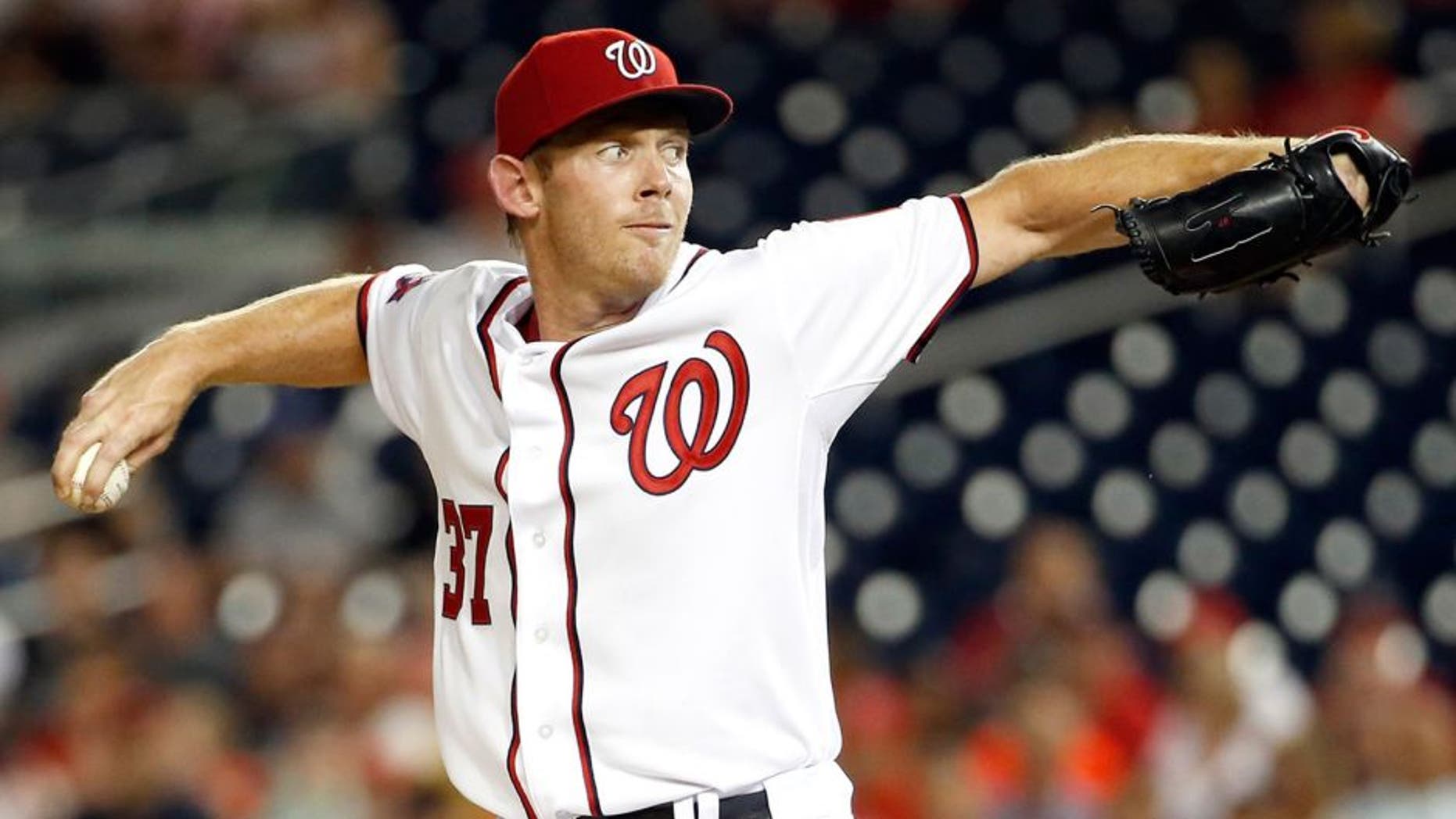 Washington Nationals starting pitcher Stephen Strasburg (37) throws during the third inning of a baseball game against the Atlanta Braves at Nationals Park, Tuesday, June 23, 2015, in Washington. (AP Photo/Alex Brandon)