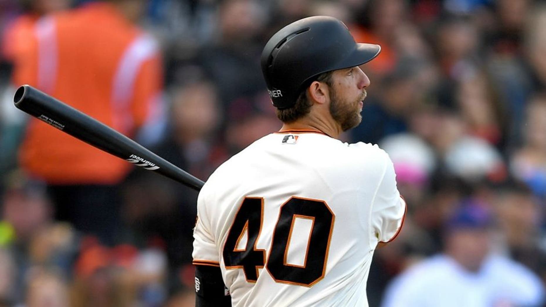 SAN FRANCISCO, CA - MAY 22: Madison Bumgarner #40 of the San Francisco Giants hits an rbi double scoring Gregor Blanco #7 against the Chicago Cubs in the bottom of the fifth inning at AT&T Park on May 22, 2016 in San Francisco, California. (Photo by Thearon W. Henderson/Getty Images)