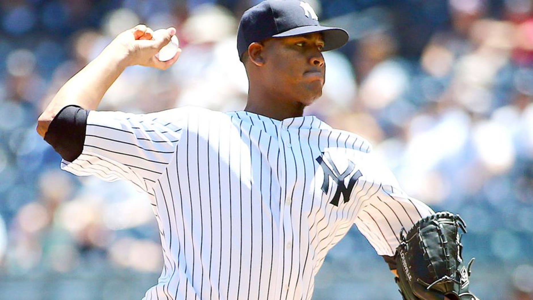 Jun 24, 2015; Bronx, NY, USA; New York Yankees starting pitcher Ivan Nova (47) throws a pitch against the Philadelphia Phillies at Yankee Stadium. Mandatory Credit: Andy Marlin-USA TODAY Sports