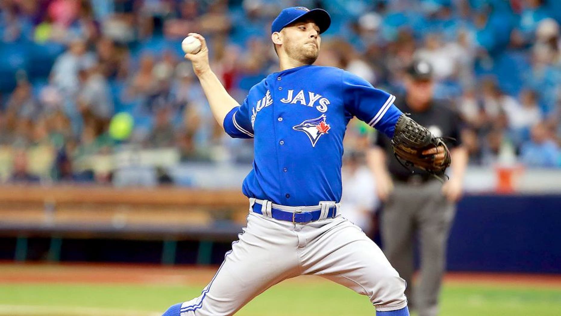 Jun 24, 2015; St. Petersburg, FL, USA; Toronto Blue Jays relief pitcher Marco Estrada (25) throws a pitch during the third inning against the Tampa Bay Rays at Tropicana Field. Mandatory Credit: Kim Klement-USA TODAY Sports