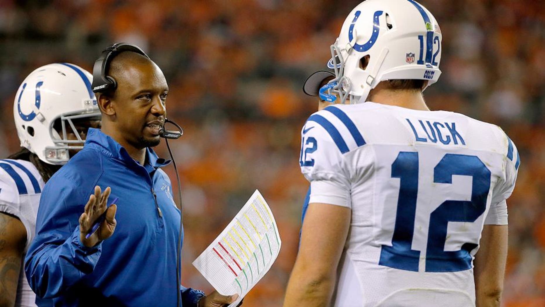 DENVER, CO - SEPTEMBER 07: Indianapolis Colts offensive coordinator Pep Hamilton talks with quarterback Andrew Luck #12 of the Indianapolis Colts during a time out against the Denver Broncos at Sports Authority Field at Mile High on September 7, 2014 in Denver, Colorado. The Broncos defeated the Colts 31-24. (Photo by Doug Pensinger/Getty Images) *** Local Caption *** Pep Hamilton; Andrew Luck