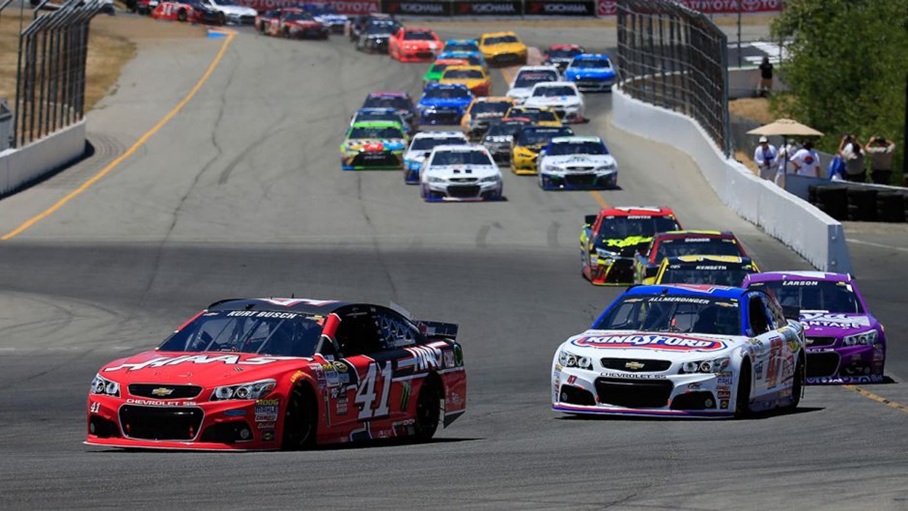 SONOMA, CA - JUNE 28: Kurt Busch, driver of the #41 Haas Automation Chevrolet, leads a pack of cars during the NASCAR Sprint Cup Series Toyota/Save Mart 350 at Sonoma Raceway on June 28, 2015 in Sonoma, California. (Photo by Chris Trotman/NASCAR via Getty Images)