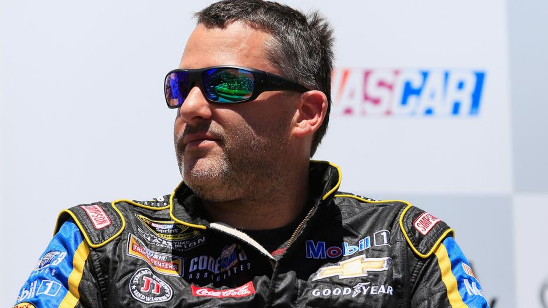 SONOMA, CA - JUNE 24: Tony Stewart, driver of the #14 Code 3 Assoc/Mobil 1 Chevrolet, is inducted into the Sonoma Raceway Wall Of Fame after practice for the NASCAR Sprint Cup Series Toyota/Save Mart 350 at Sonoma Raceway on June 24, 2016 in Sonoma, California. (Photo by Chris Trotman/NASCAR via Getty Images)