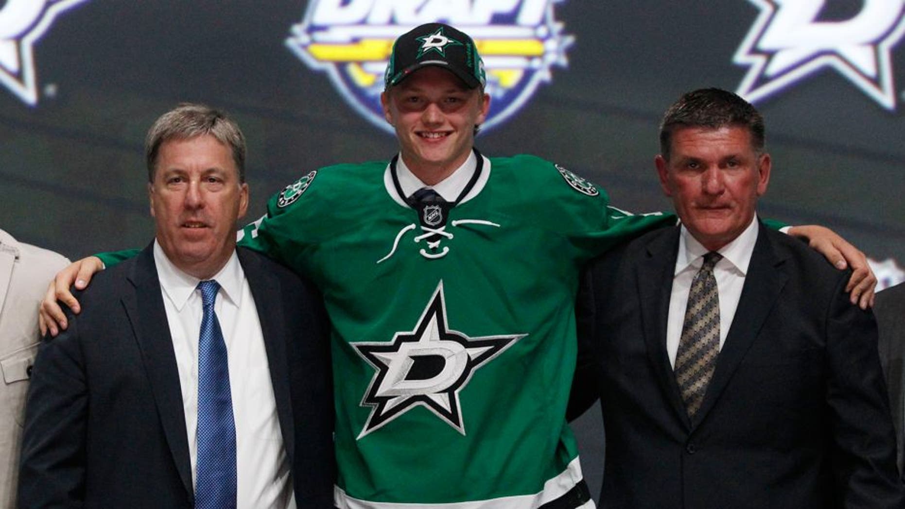 Jun 24, 2016; Buffalo, NY, USA; Riley Tufte poses for a photo after being selected as the number twenty-five overall draft pick by the Dallas Stars in the first round of the 2016 NHL Draft at the First Niagra Center. Mandatory Credit: Timothy T. Ludwig-USA TODAY Sports