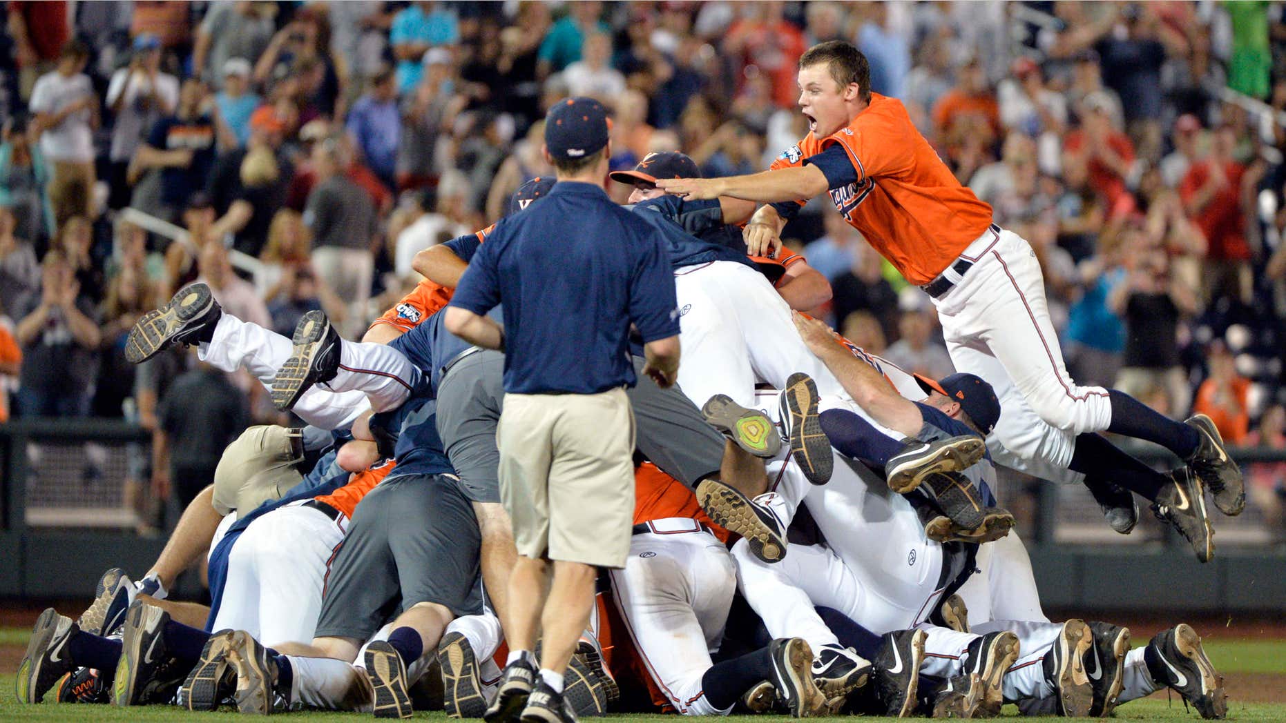 June 24, 2015: Virginia celebrates winning Game 3 of the best-of-three NCAA baseball College World Series finals against Vanderbilt, 4-2-, at TD Ameritrade Park in Omaha, Neb.