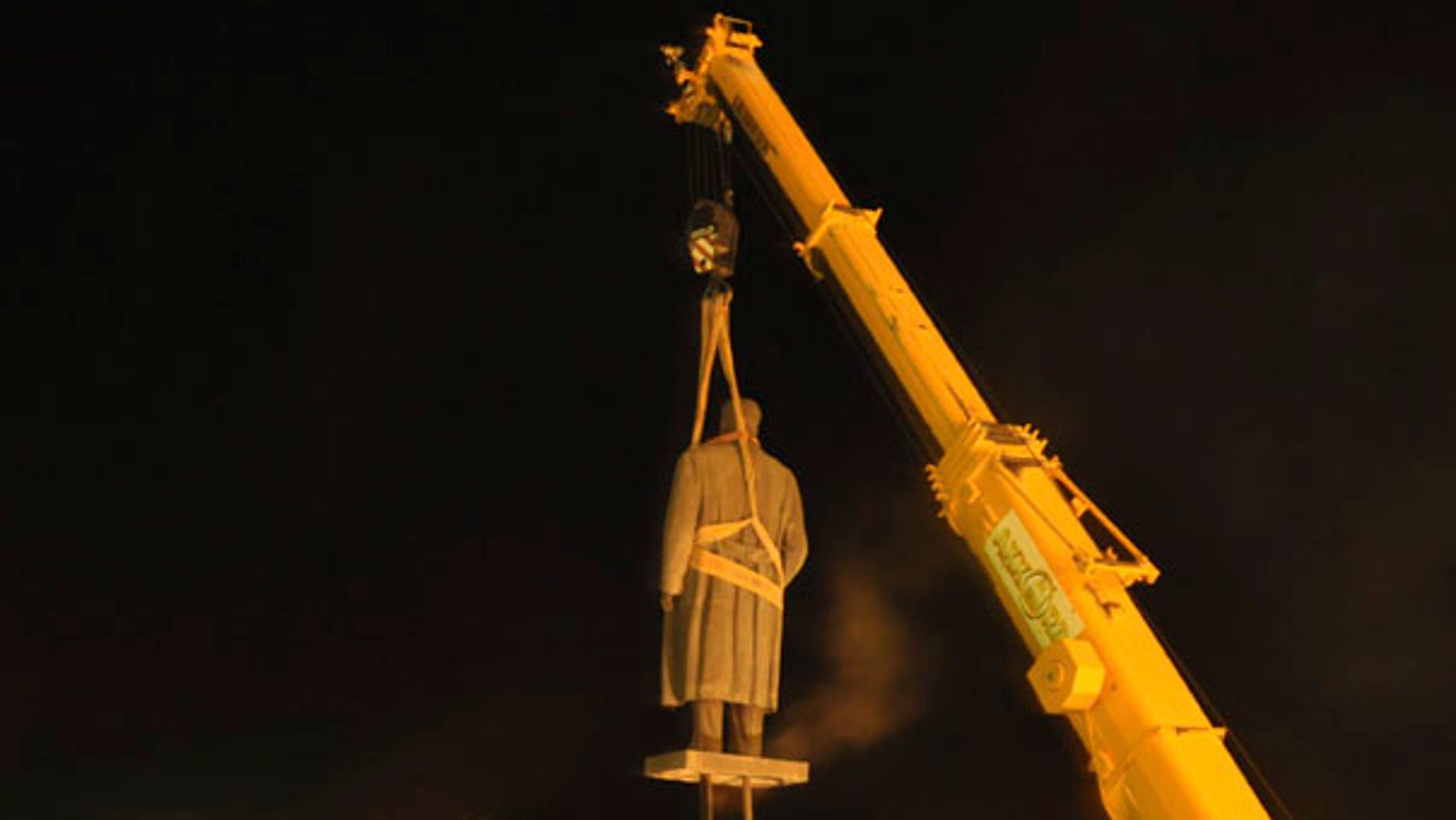 June 25: A statue of Soviet dictator Josef Stalin is dismantled at his home town of Gori, 50 miles west of the Georgian capital Tbilisi, making way for a memorial to the fallen in the Russian-Georgian war of 2008.