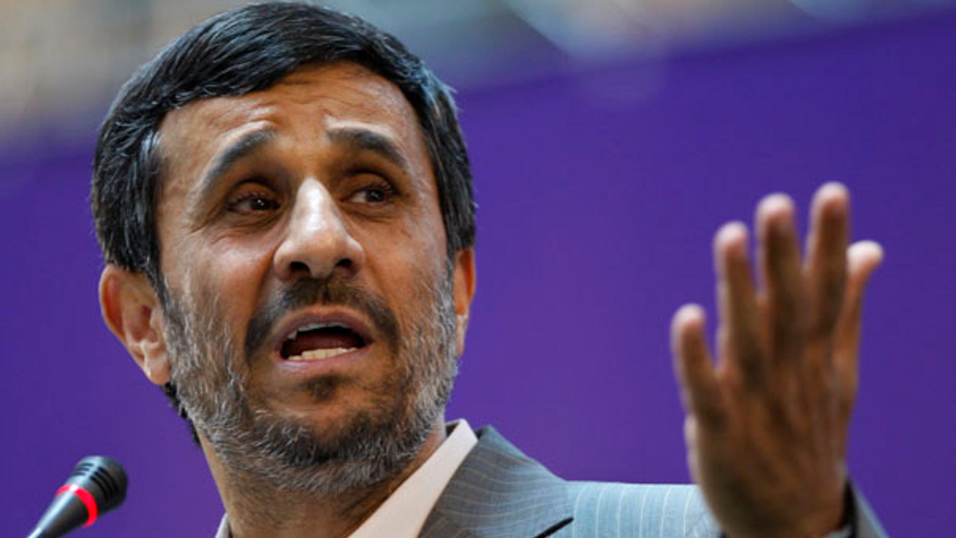 June 20: Iranian President Mahmoud Ahmadinejad gestures while speaking in the International Conference of Islamic World Publishers in Tehran.