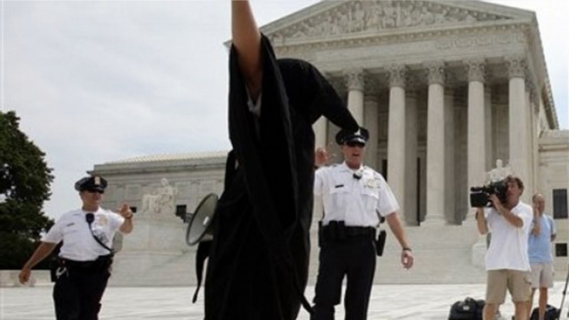 Anti-abortion protesters demonstrate in front of the Supreme Count in Washington, Monday, June 28, 2010. (AP)