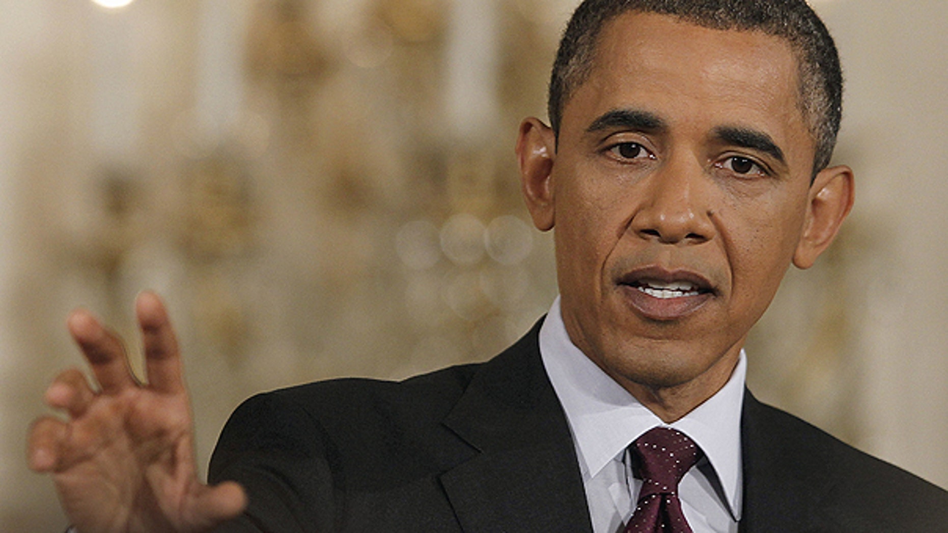 June 29: President Obama gestures during a news conference in the East Room of the White House in Washington.