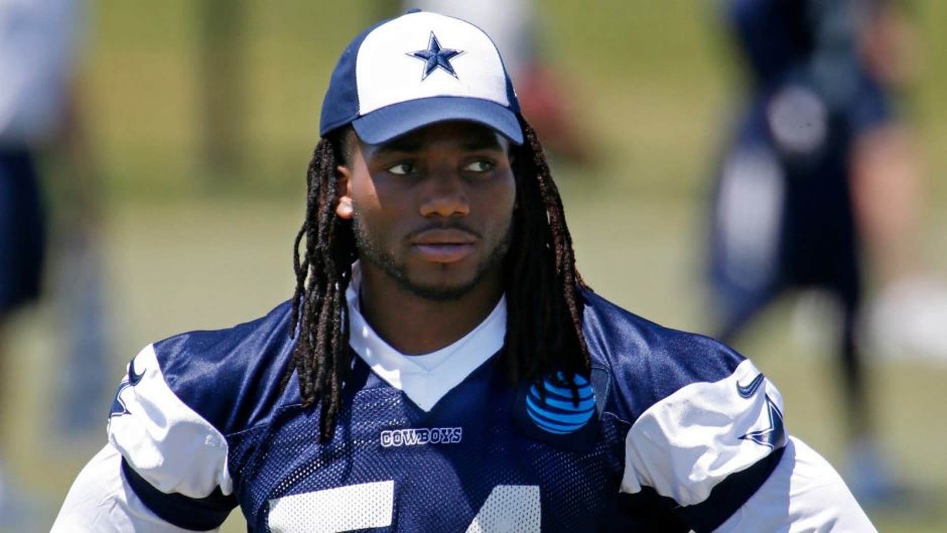 Dallas Cowboys linebacker Jaylon Smith (54), a second-round pick, watches the action during the team's rookie camp at Valley Ranch in Irving, Texas, on Friday, May 6, 2016. (Paul Moseley/Fort Worth Star-Telegram/TNS)
