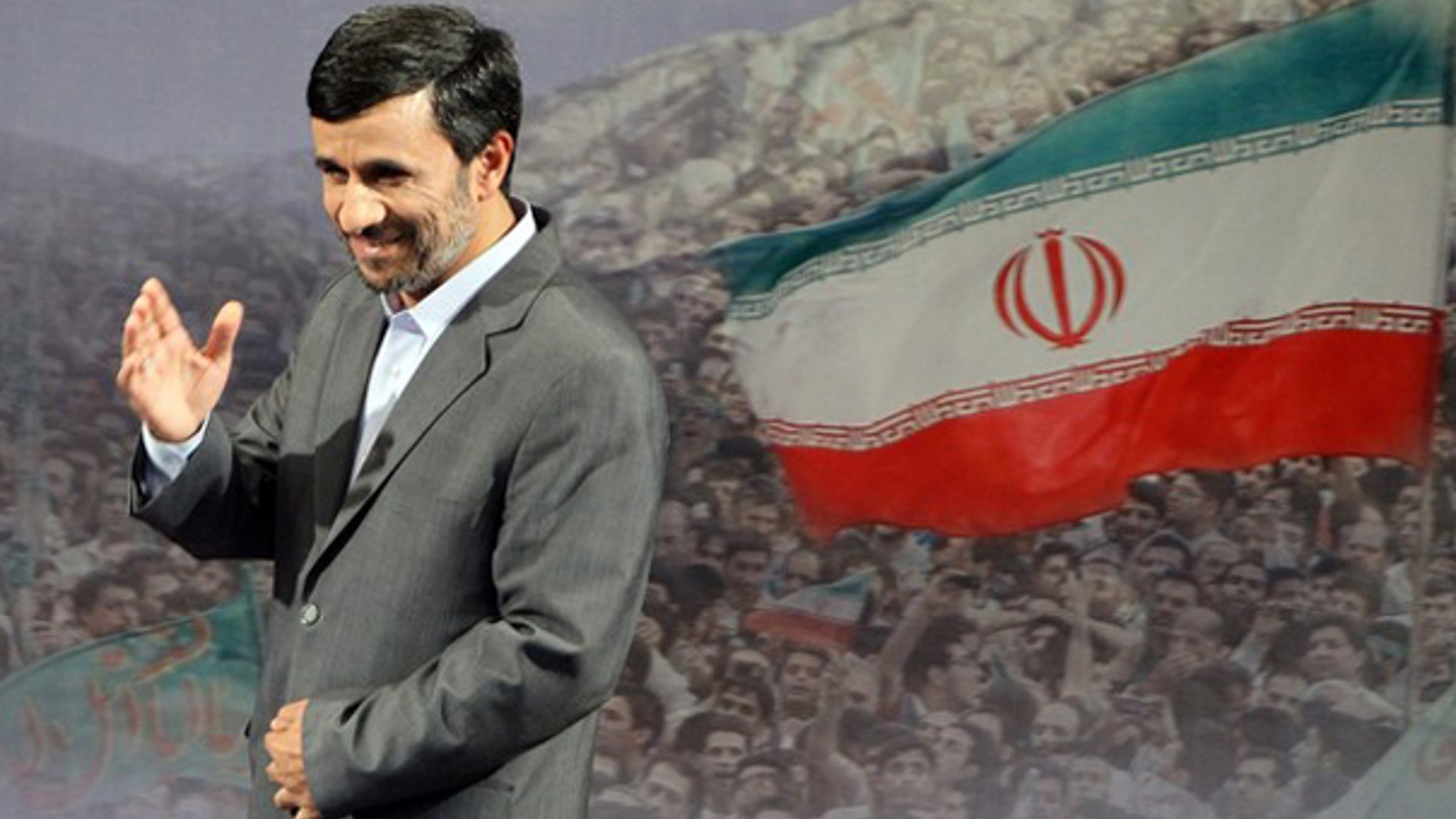 June 28: Iranian President Mahmoud Ahmadinejad gestures after speaking to the press in Tehran.