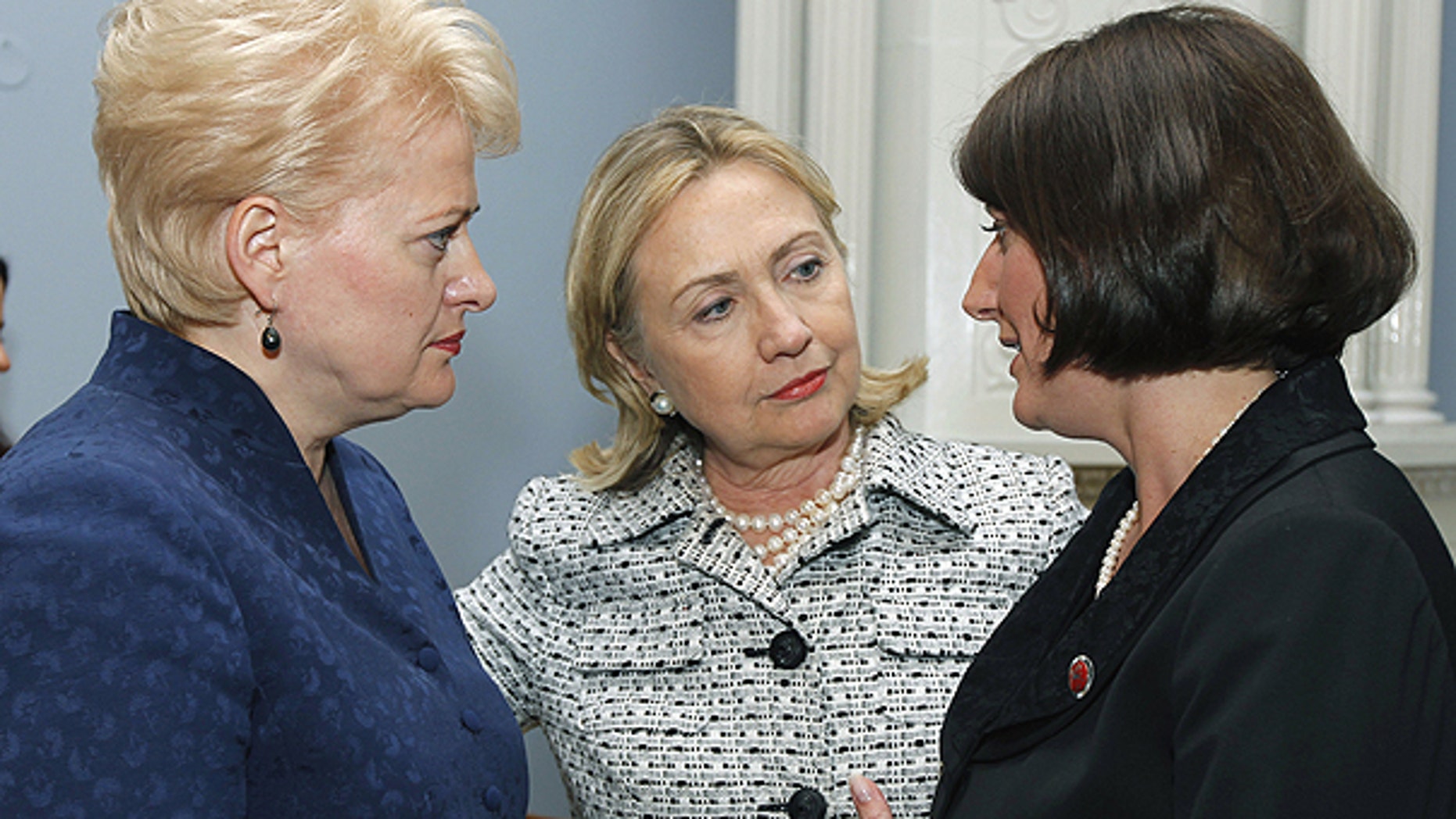 June 30: From left, Lithuania's President Dalia Grybauskaite, Secretary of State Hillary Clinton , and Kosovo President Atifete Jahjaga, speak at the Presidential Palace in Vilnius, Lithuania.