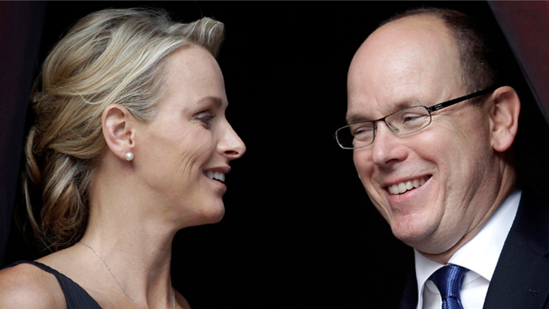 June 23: Prince Albert II of Monaco and his fiancee Charlene Wittstock attend the St. Jean Religious Parade in Monaco.