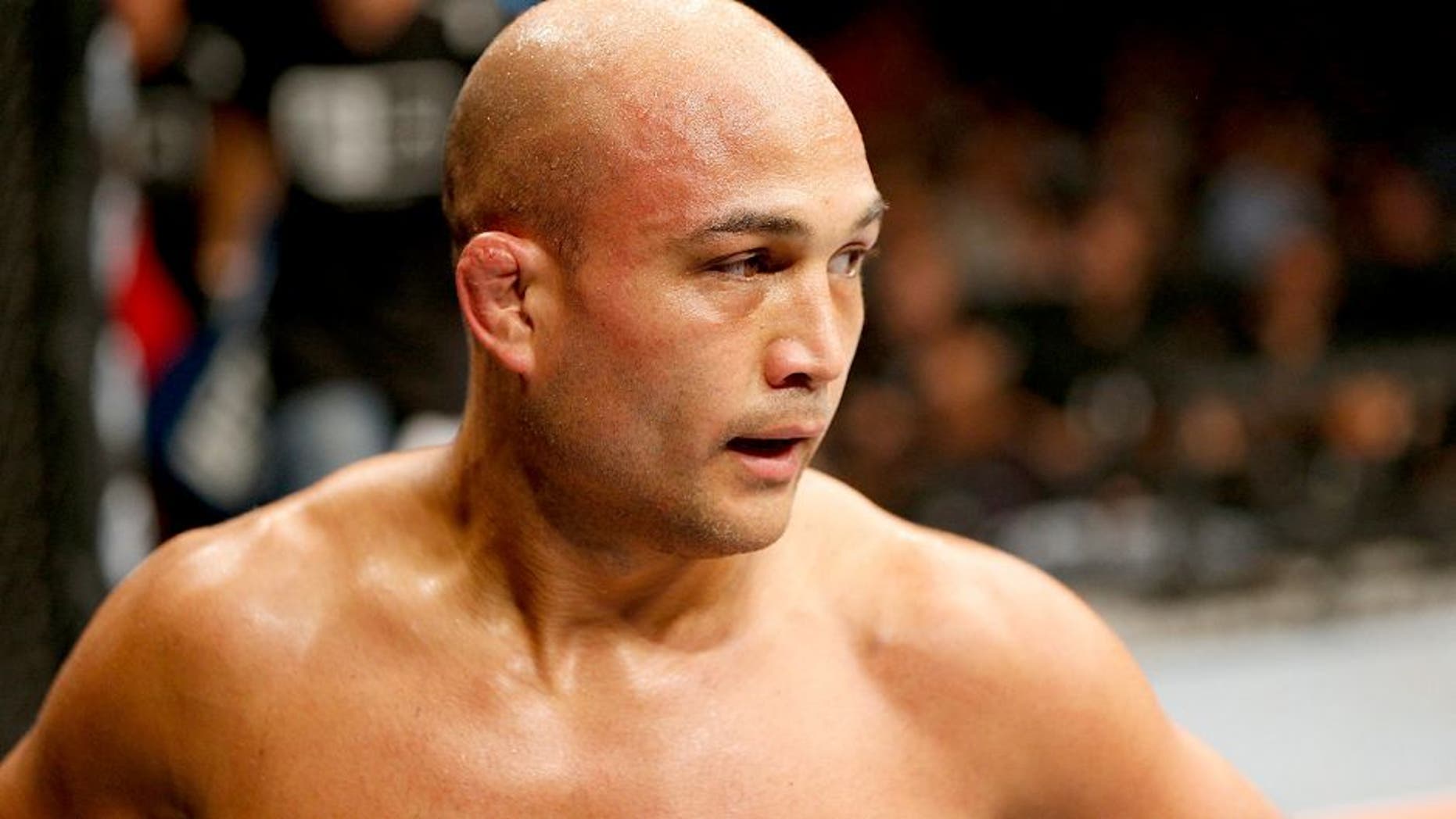 LAS VEGAS, NV - JULY 06: BJ Penn recovers between rounds in his featherweight fight with Frankie Edgar during the Ultimate Fighter Finale inside the Mandalay Bay Events Center on July 6, 2014 in Las Vegas, Nevada. (Photo by Josh Hedges/Zuffa LLC/Zuffa LLC via Getty Images)