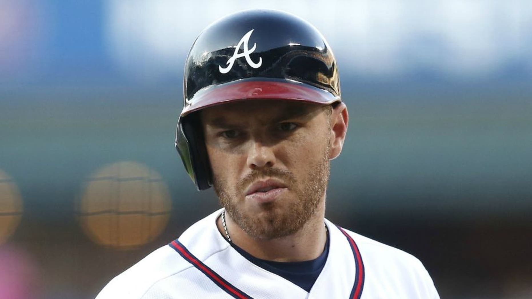 ATLANTA, GA - JUNE 10: Freddie Freeman #5 of the Atlanta Braves disagrees with a call during the game against the Chicago Cubs at Turner Field on June 10, 2016 in Atlanta, Georgia. (Photo by Mike Zarrilli/Getty Images)