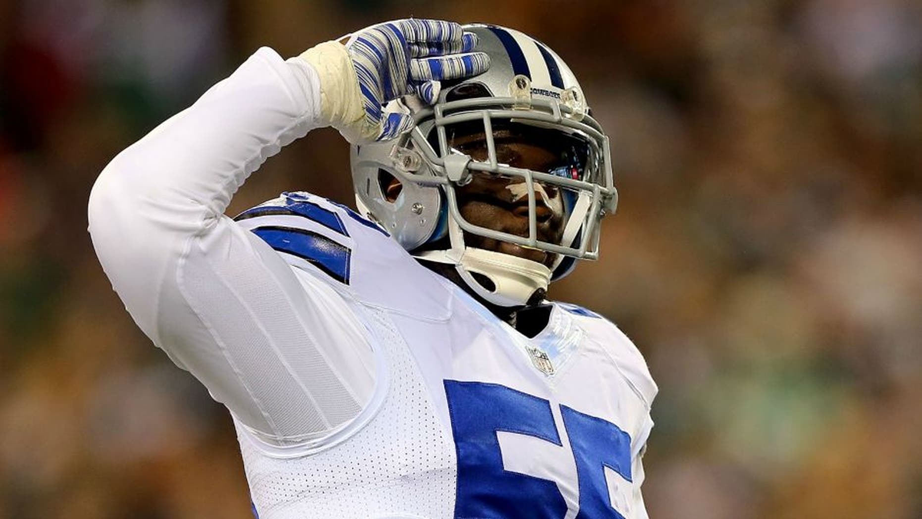 PHILADELPHIA, PA - DECEMBER 14: Rolando McClain #55 of the Dallas Cowboys reacts during the game against the Philadelphia Eagles at Lincoln Financial Field on December 14, 2014 in Philadelphia, Pennsylvania. (Photo by Elsa/Getty Images)